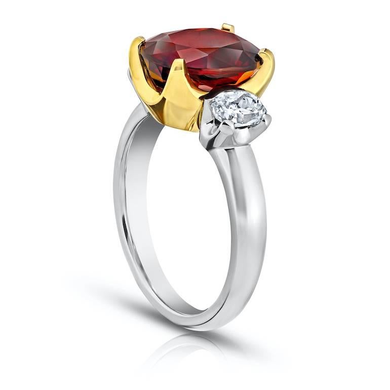 5.19 carat cushion (Burma) Red Spinel with cushion mixed cut diamonds .81 carats set in platinum and 18k yellow gold ring.

