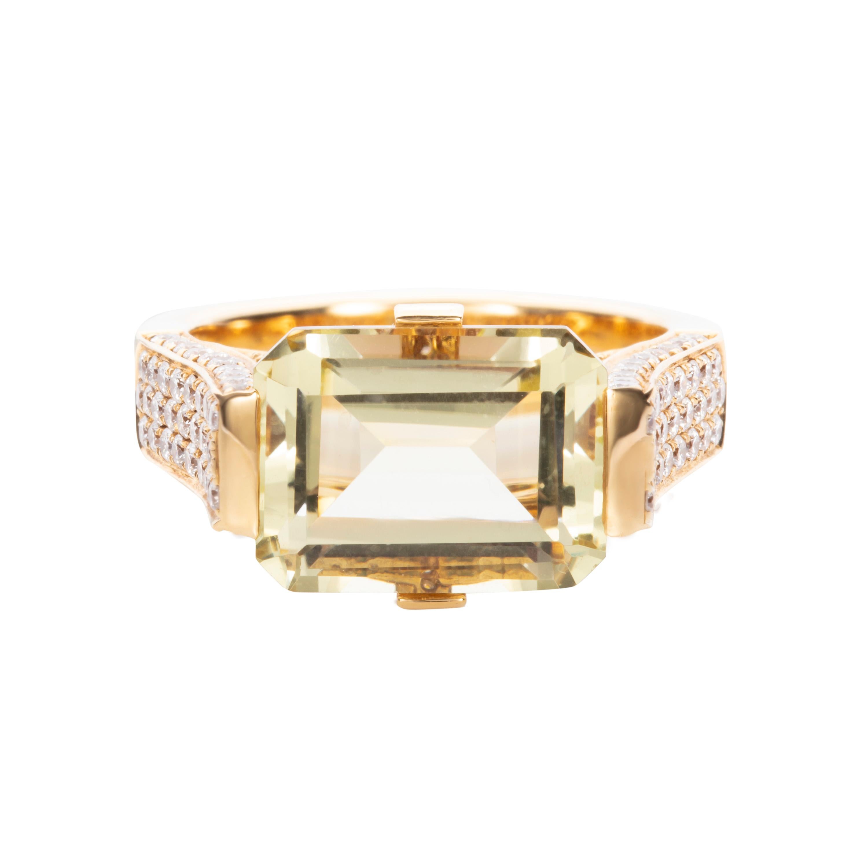 Rendered in lustrous 18-karat yellow gold, Butani's ring is centered with an unmissable 5.19 carat lemon topaz surrounded 1.0 carats of sparkling white diamonds.  Gift yours to a friend or loved one.  Currently a ring size US 7.  For other sizes,