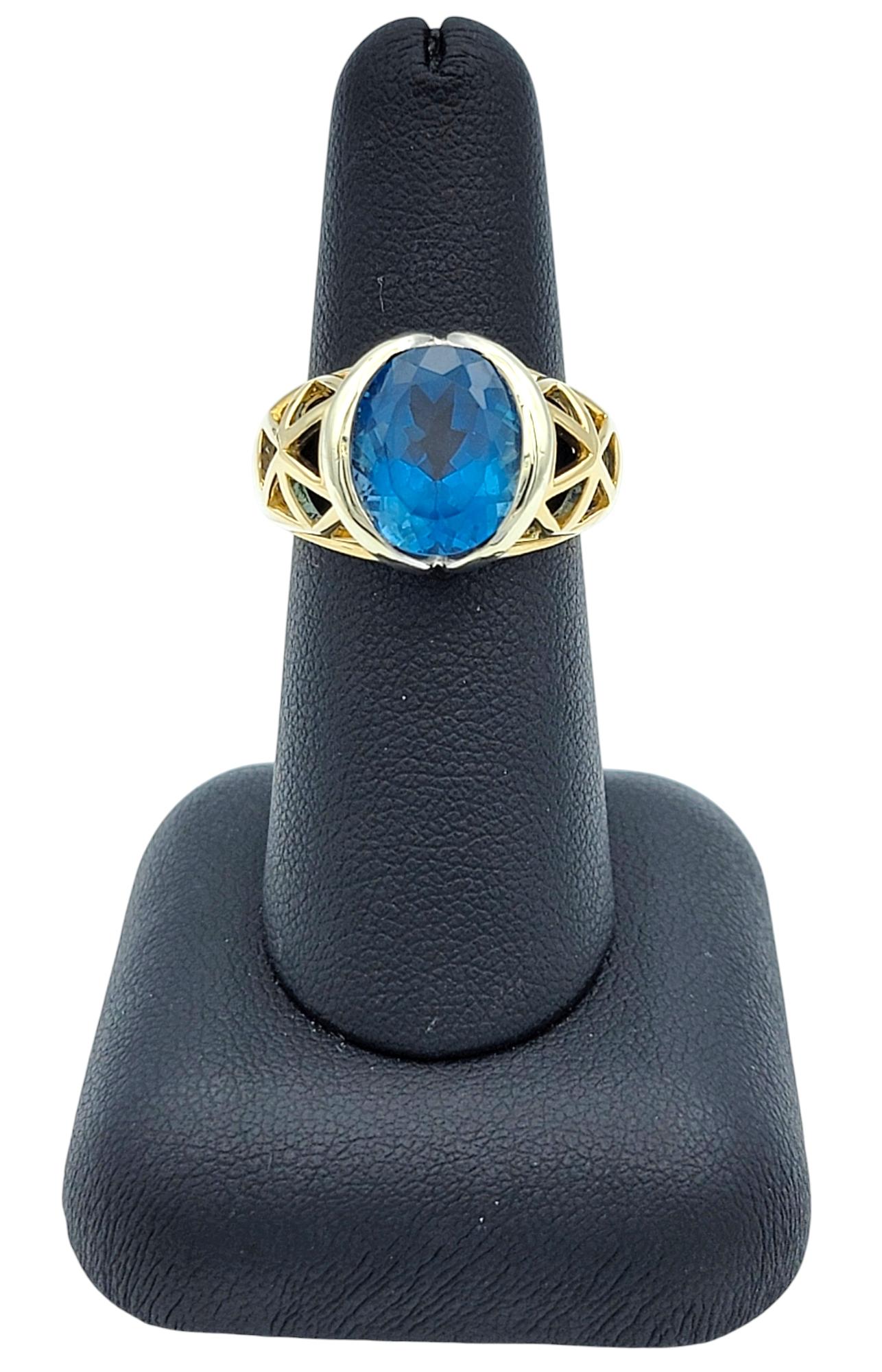 5,19 Karat Ovalschliff Schweizer Blautopas Ausschnitt Ring in zweifarbigem 14 Karat Gold im Angebot 6