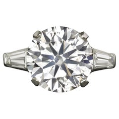 5.19 Carat Round Brilliant Cut Diamond Tapered Baguette Ring