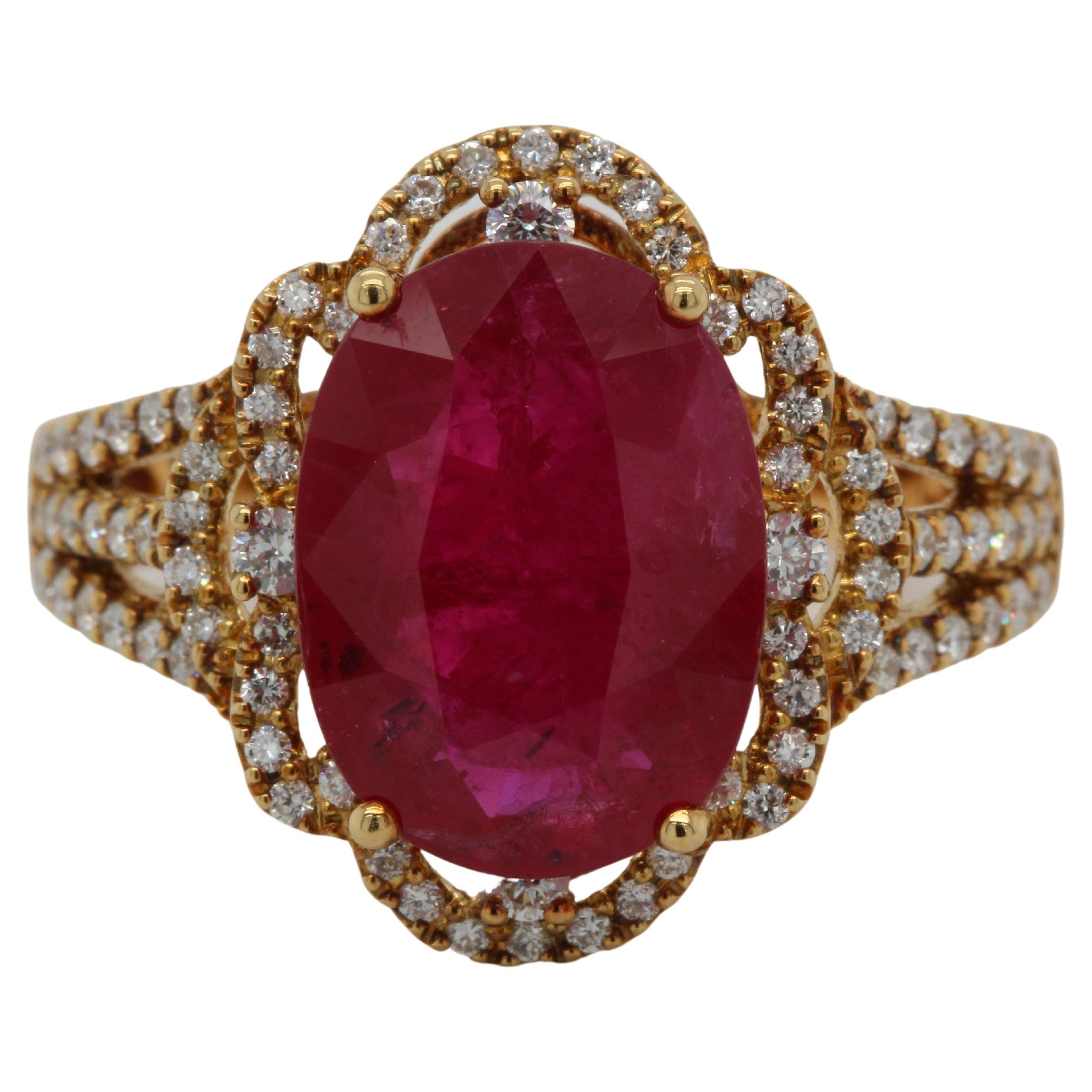 Our 5.19 carat oval ruby ring is a stunning masterpiece of elegance and simplicity. It showcases a single oval cut natural untreated ruby of the finest quality, set with 0.49 carats of white round diamonds. This exclusive ruby and diamond ring was