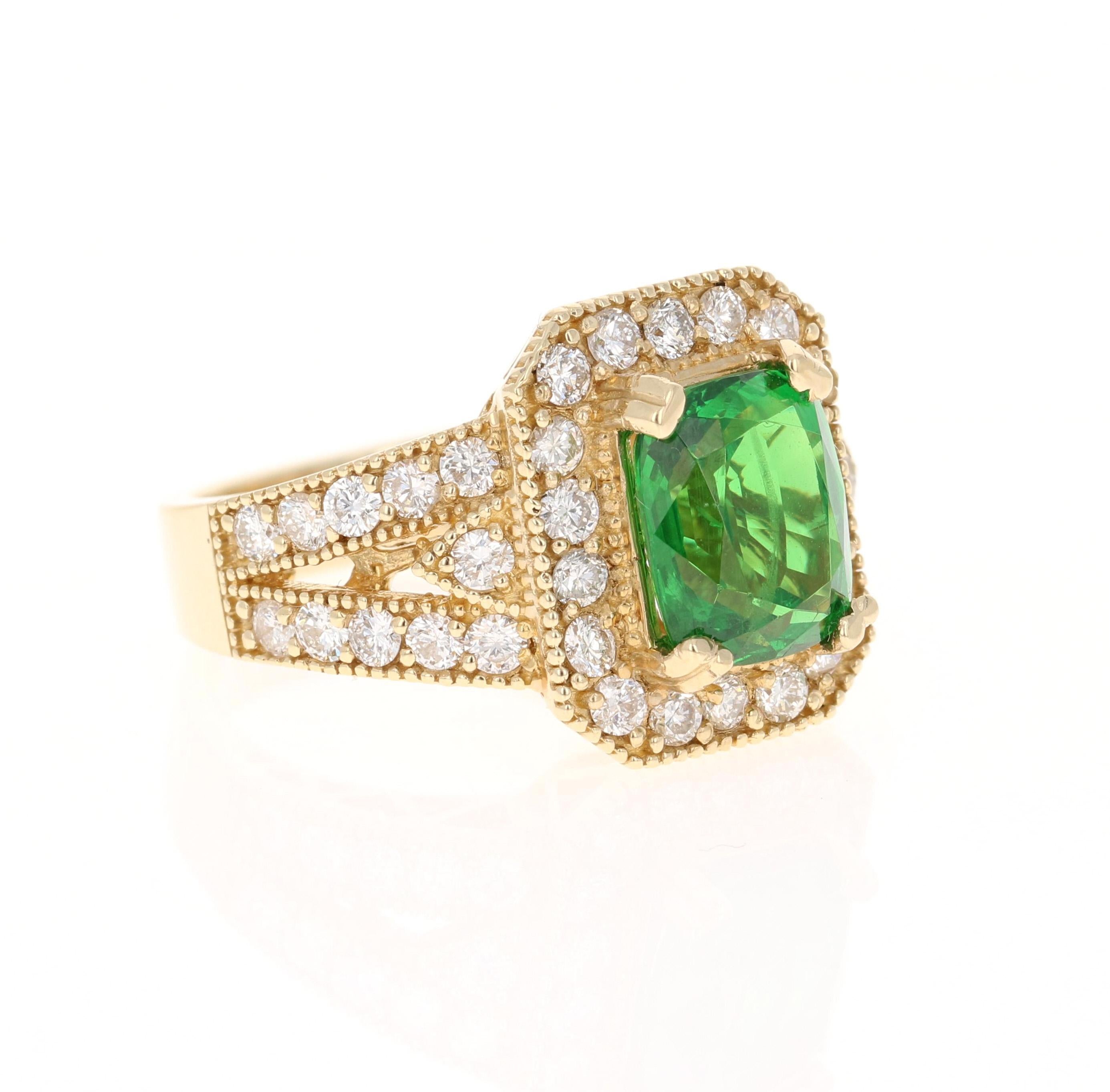 This beautiful ring has a Cushion Cut Tsavorite that is 3.81 Carats and 40 Round Cut Diamonds that weigh 1.38 Carats. (Clarity: VS, Color: F) The total carat weight of the ring is 5.19 Carats. 

Tsavorite is a natural stone that belongs to the