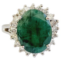 Anello con smeraldo naturale di forma ovale da 5,19 carati in oro bianco 14 carati