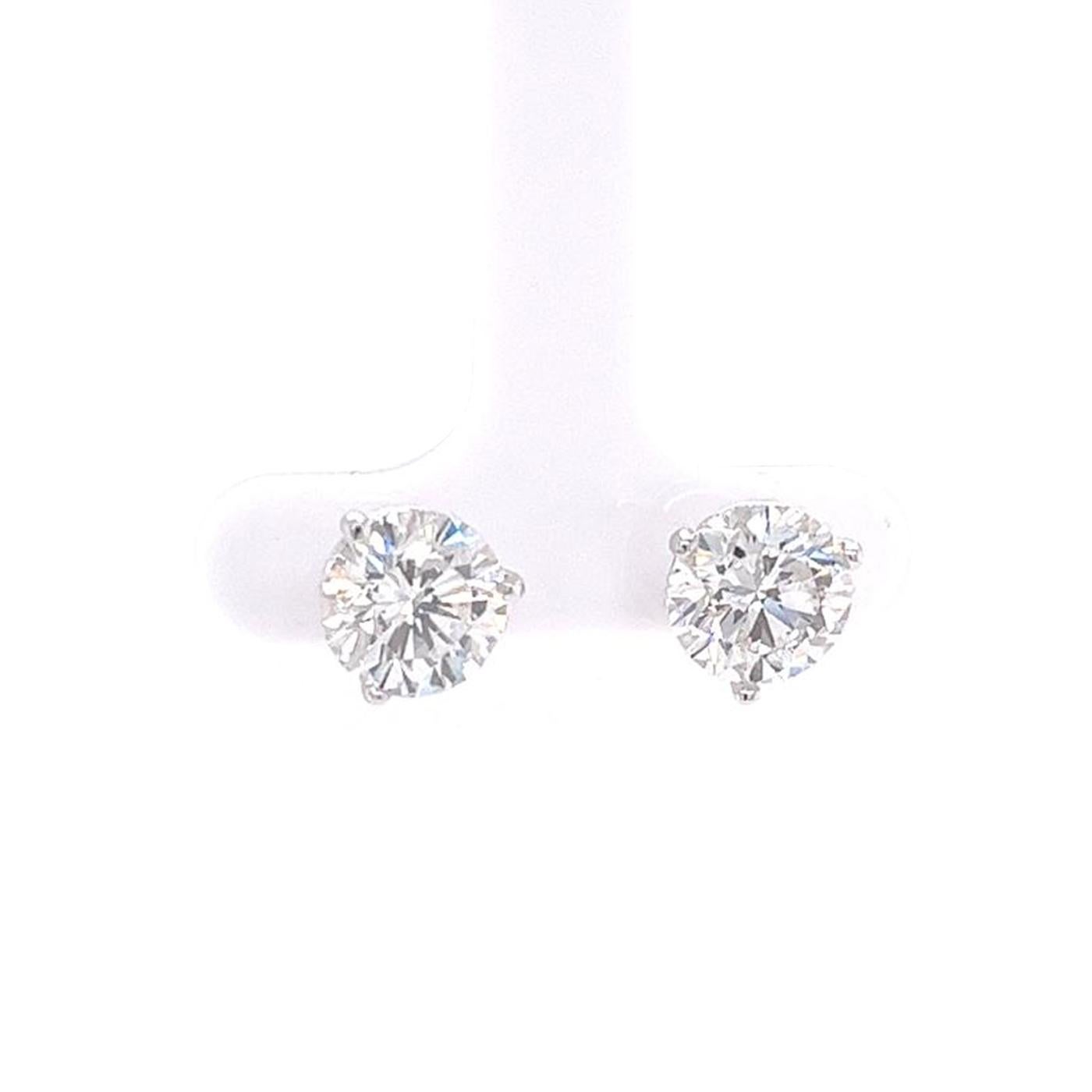 This pair of round-cut natural diamonds are impressive in size. Very well cut, dazzlingly brilliant, and eye clean in the ear! Both are exceptionally well cut, They are very brilliant, Perfect for studs! They are graded H for color. They are bright