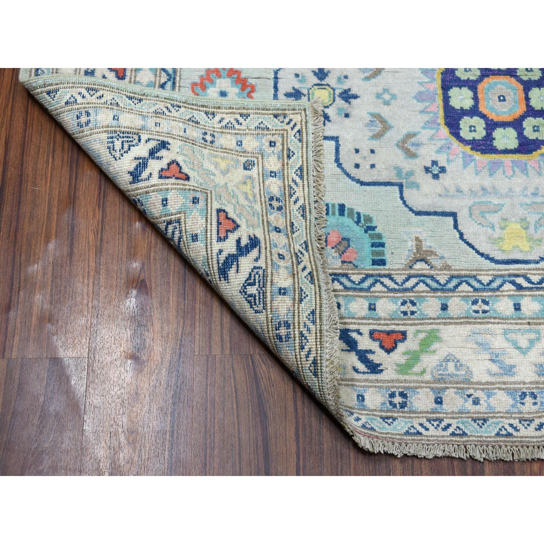 This is a truly genuine one-of-a-kind Colorful Gray Fusion Kazak Pure Wool Geometric Design Hand Knotted Rug.It has been Knotted for months and months in the centuries-old Persian weaving craftsmanship techniques by expert artisans.
Primary