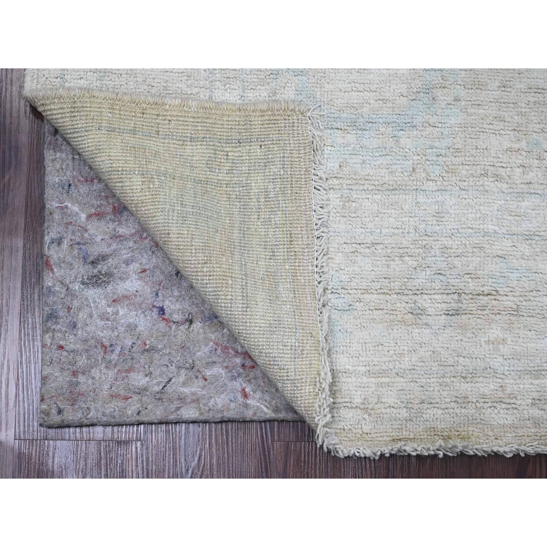 Alabaster White, 100% Wool, Afghan Angora Oushak with Muted Colors Leaf Design, Hand Knotted, Veggie Dyes, Oriental Rug
Primary materials: Wool
Latex: No Pile 
height: 0.25 Inches
Style: Transitional
Primary color: Ivory
Secondary colors: Blue,