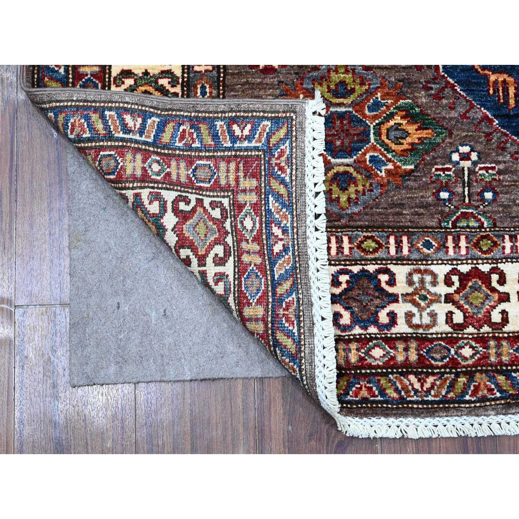 This is a truly genuine one-of-a-kind Afghan Super Kazak, Hand Knotted, Pure Wool, Oriental Rug. It has been Knotted for months and months in the centuries-old weaving craftsmanship techniques by expert artisans.
Primary materials: Wool
Latex: No