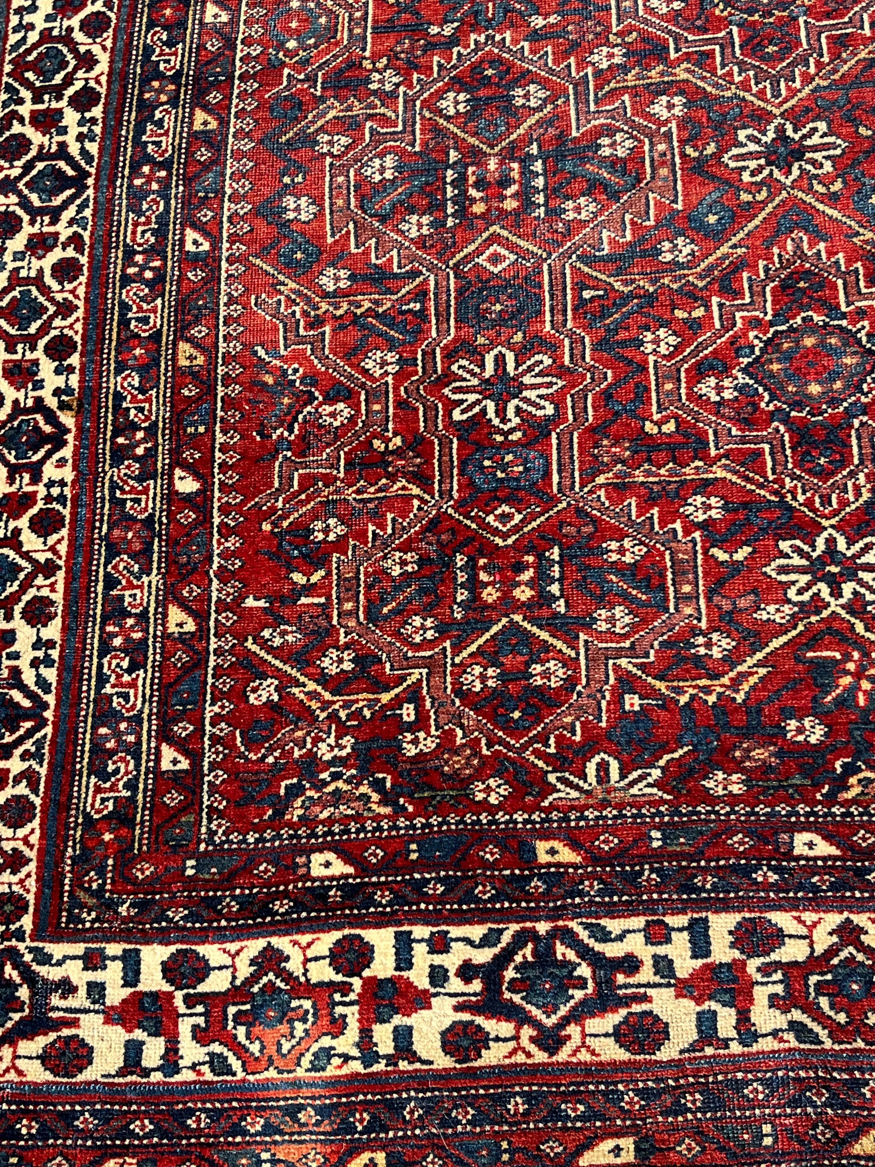 Nice thin piled, tightly woven Oriental rug with even wear. Overall pattern on a rust colored field. Great squarish size. Minor end loss with ends professionally secured. Measures: 5''1