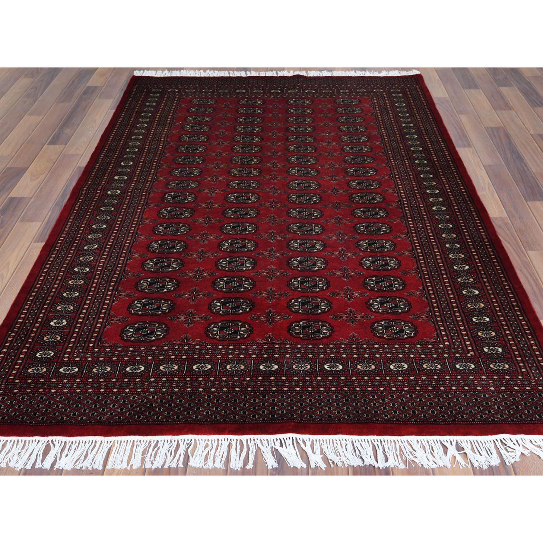 This is a truly genuine one-of-a-kind 250 KPSI Silky Wool Denser Weave Hand Knotted Super Bokara Deep Rich Red Oriental Rug. It has been Knotted for months and months in the centuries-old Persian weaving craftsmanship techniques by expert