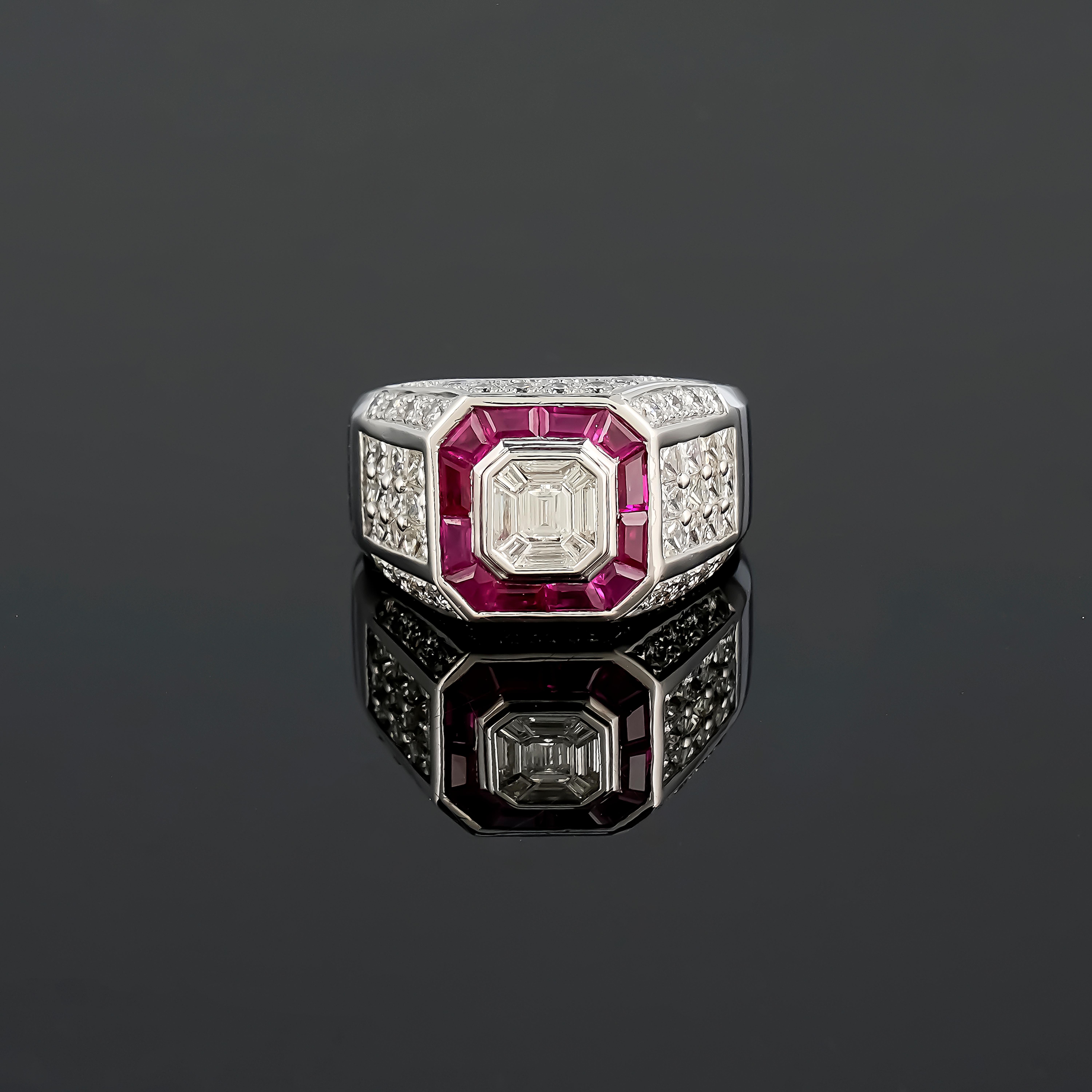 Make a statement with this one of a kind 5.2 carat VS quality White Diamond and 0.83 carat Ruby ring. Each diamond and ruby is perfectly cut to create this intricate design, making it truly very unique! The invisible setting of the diamonds and