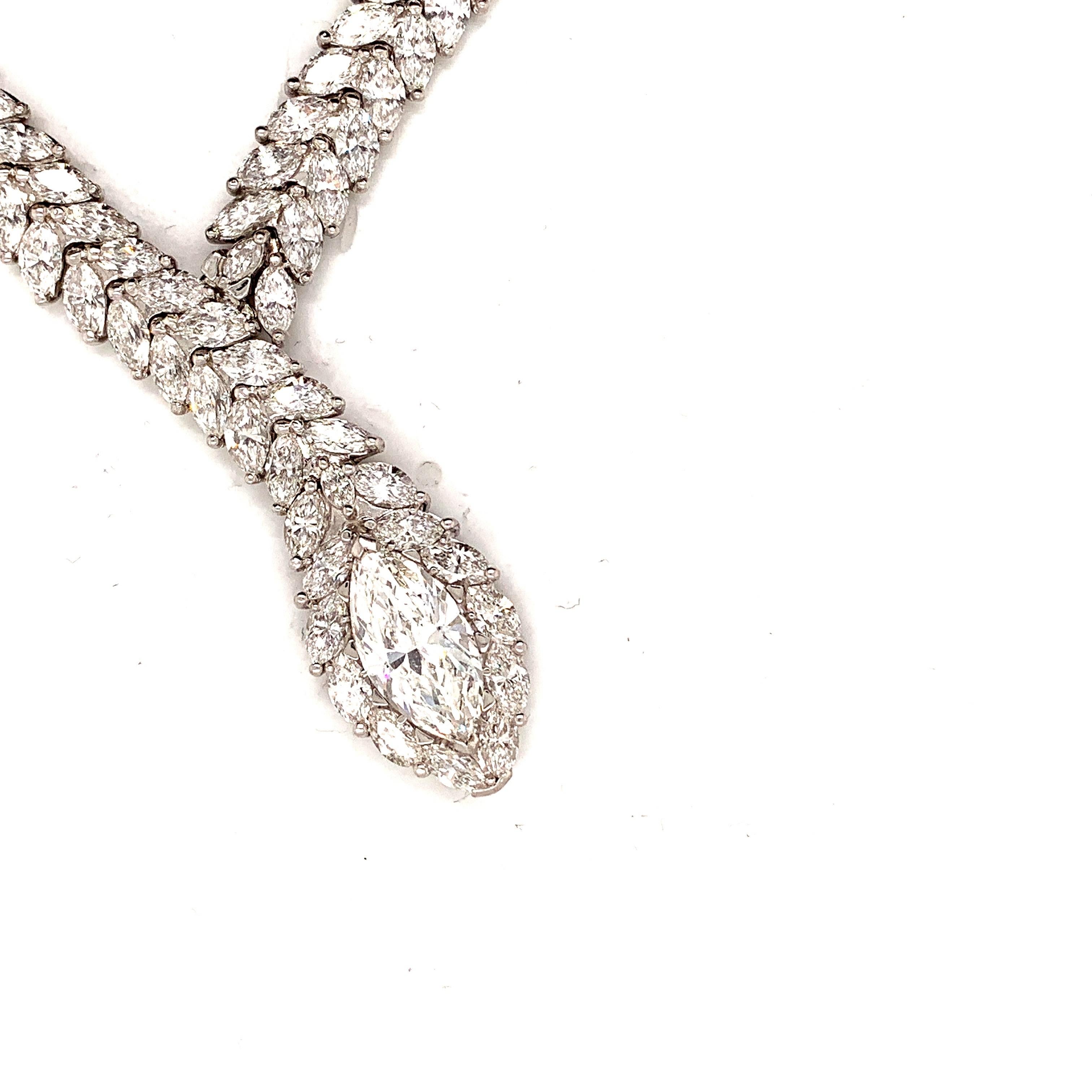Magnificent snake motif necklace.
54 carats D-E-F color vs2+ clarity of perfectly cut marquise cut diamonds set in 18k gold make up this incredible necklace. The “head of the snake” is a dazzling 4.52 carat E color VS2 clarity marquise cut Diamond.