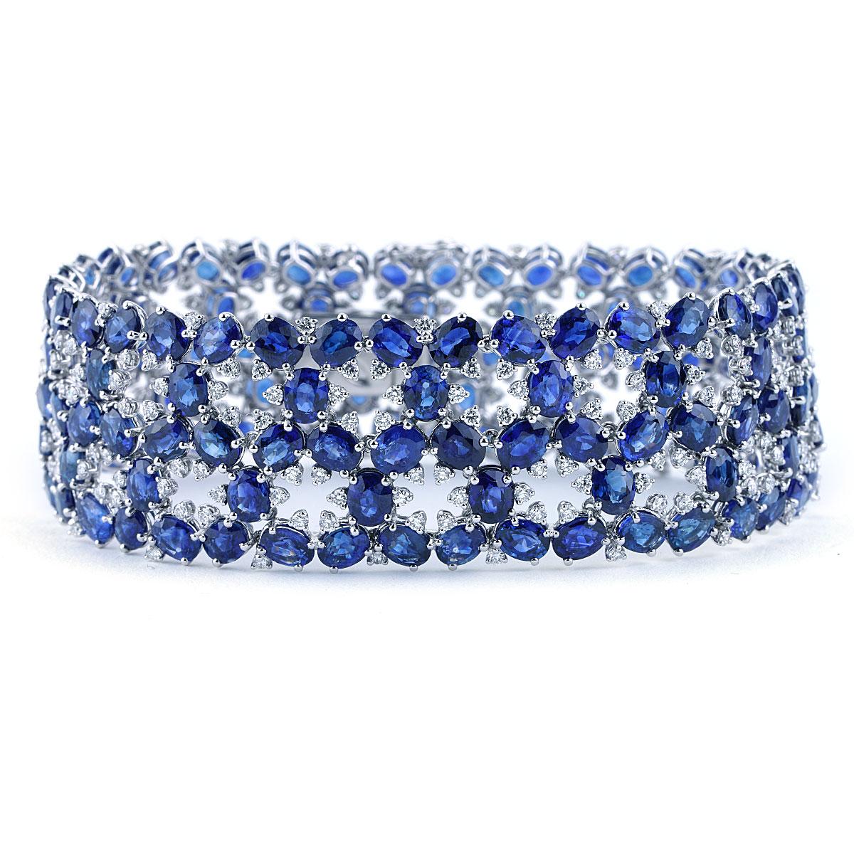 Introducing our stunning Multi-Row Sapphire and Diamond Fashion Bracelet, a masterpiece of sophistication and style. Crafted with exquisite artistry, this bracelet boasts a captivating design that effortlessly combines timeless elegance with