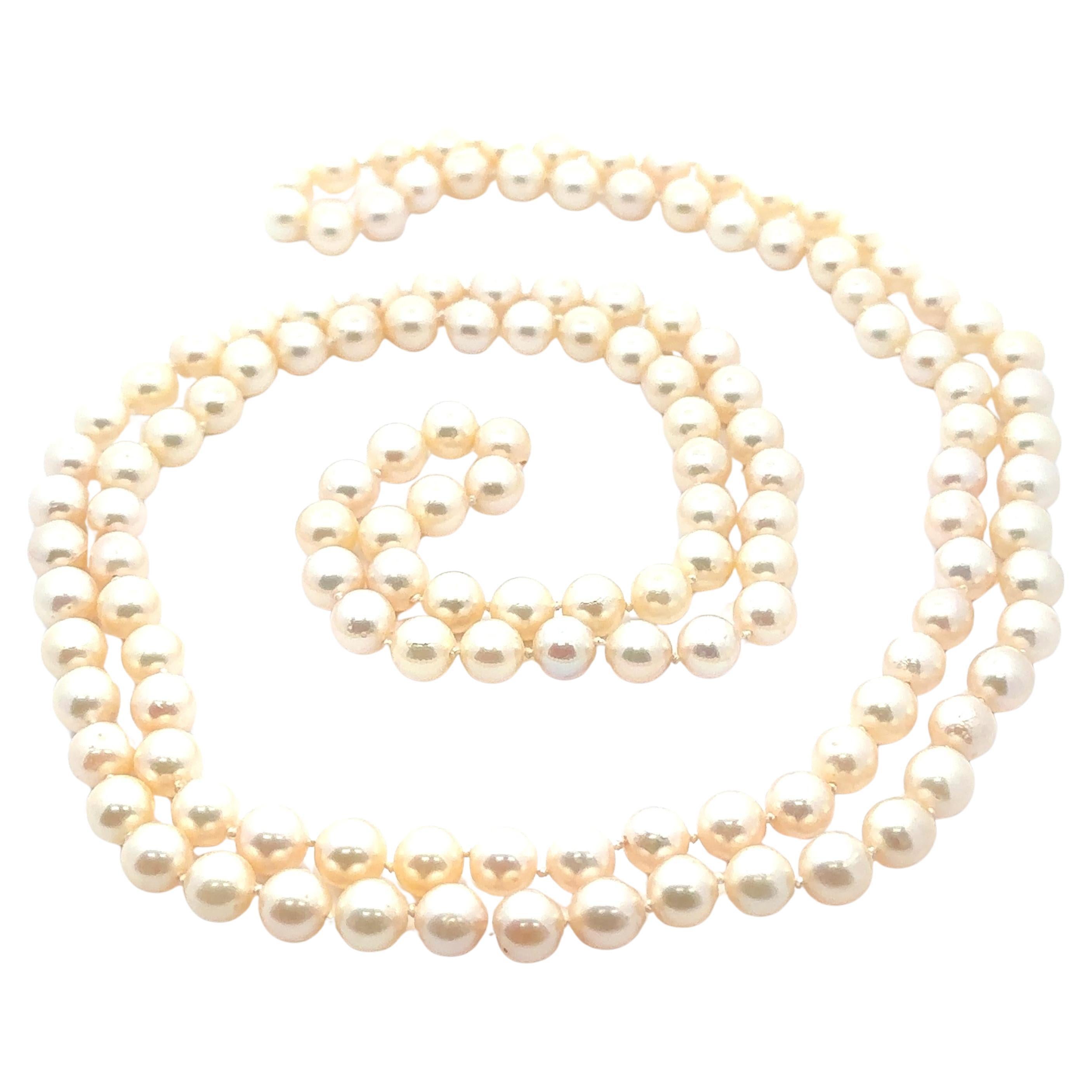 Collier de 52" de perles d
Akoya GIA blanches, roses et vertes, 8,34-9,02 mm. en vente