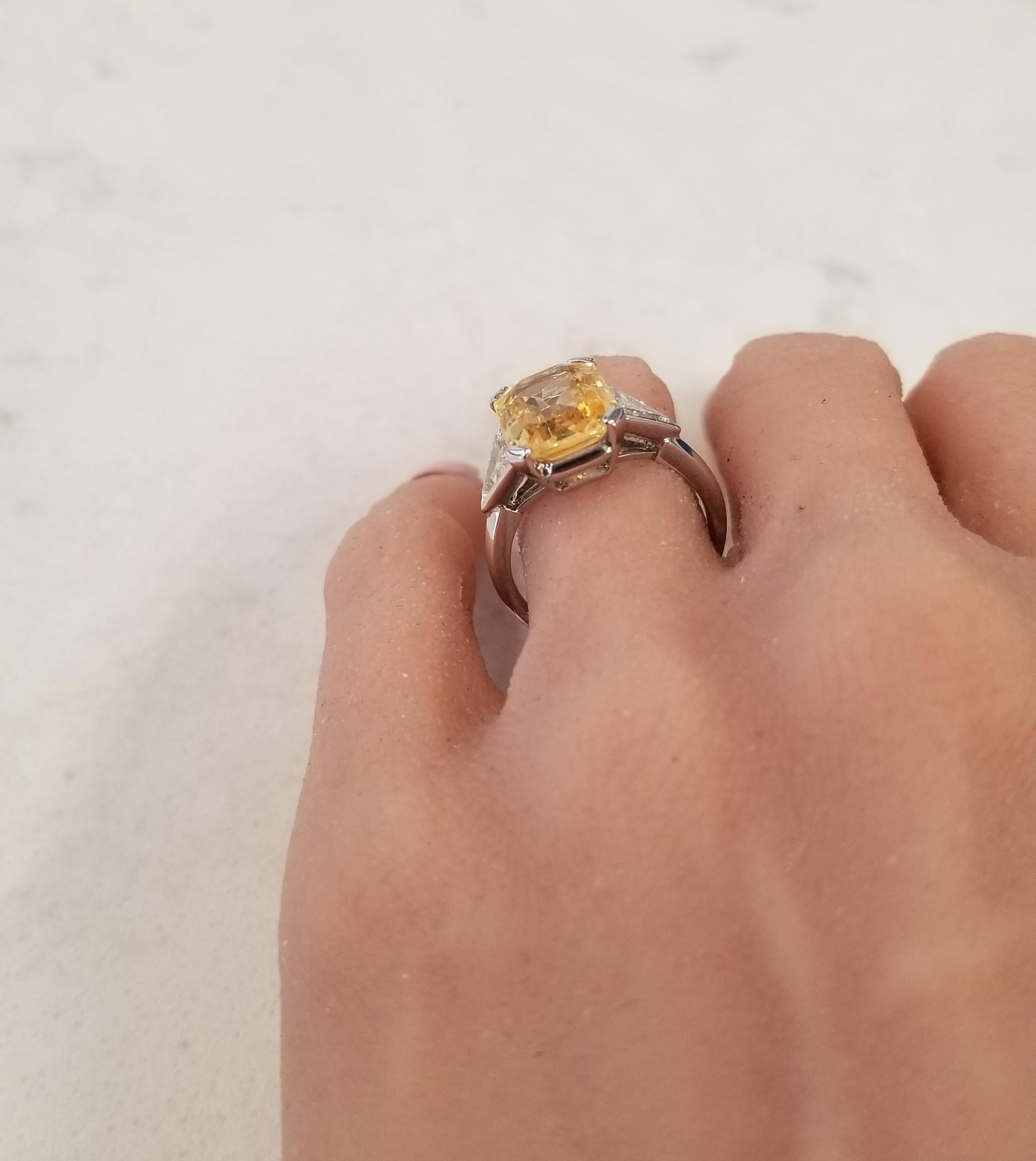 Contemporary 5.20 Carat Emerald Cut Yellow Sapphire and Diamond Cocktail Ring in Platinum