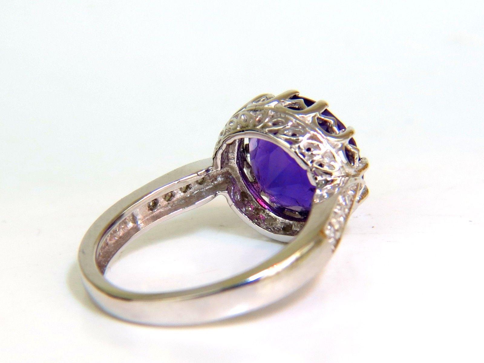 Amethyst Edwardian Deco

5.00ct. Brilliant Natural Amethyst 
Amazing Full Round / Brilliant cut

Clean VVS Clarity

Beautiful purple sparkles throughout

Transparency A+

Diameter: 11.3mm



Side diamonds total: .20ct.

Brilliant sparkling rounds
