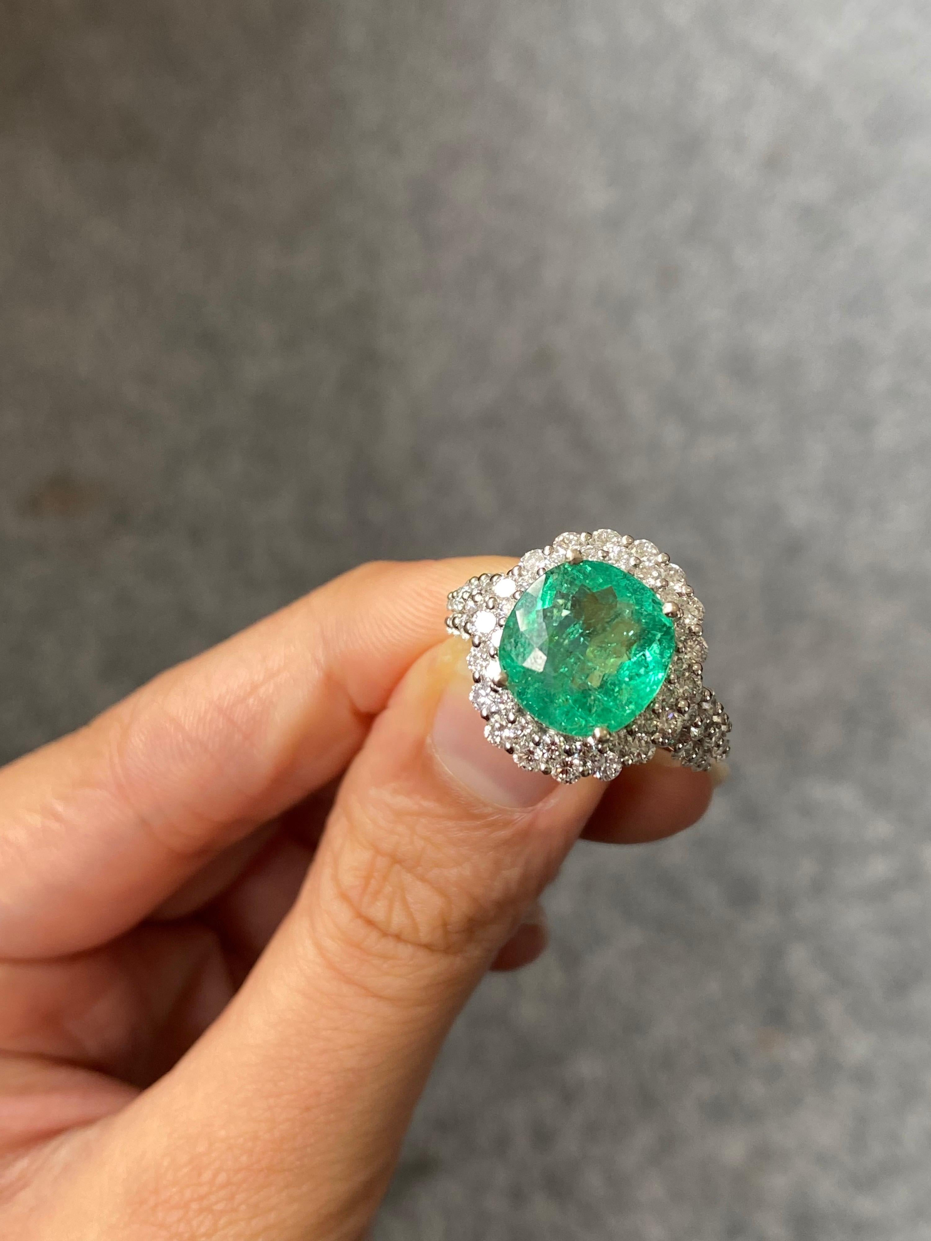 Oval Cut 5.20 Carat Paraiba Tourmaline and Diamond Engagement Ring For Sale