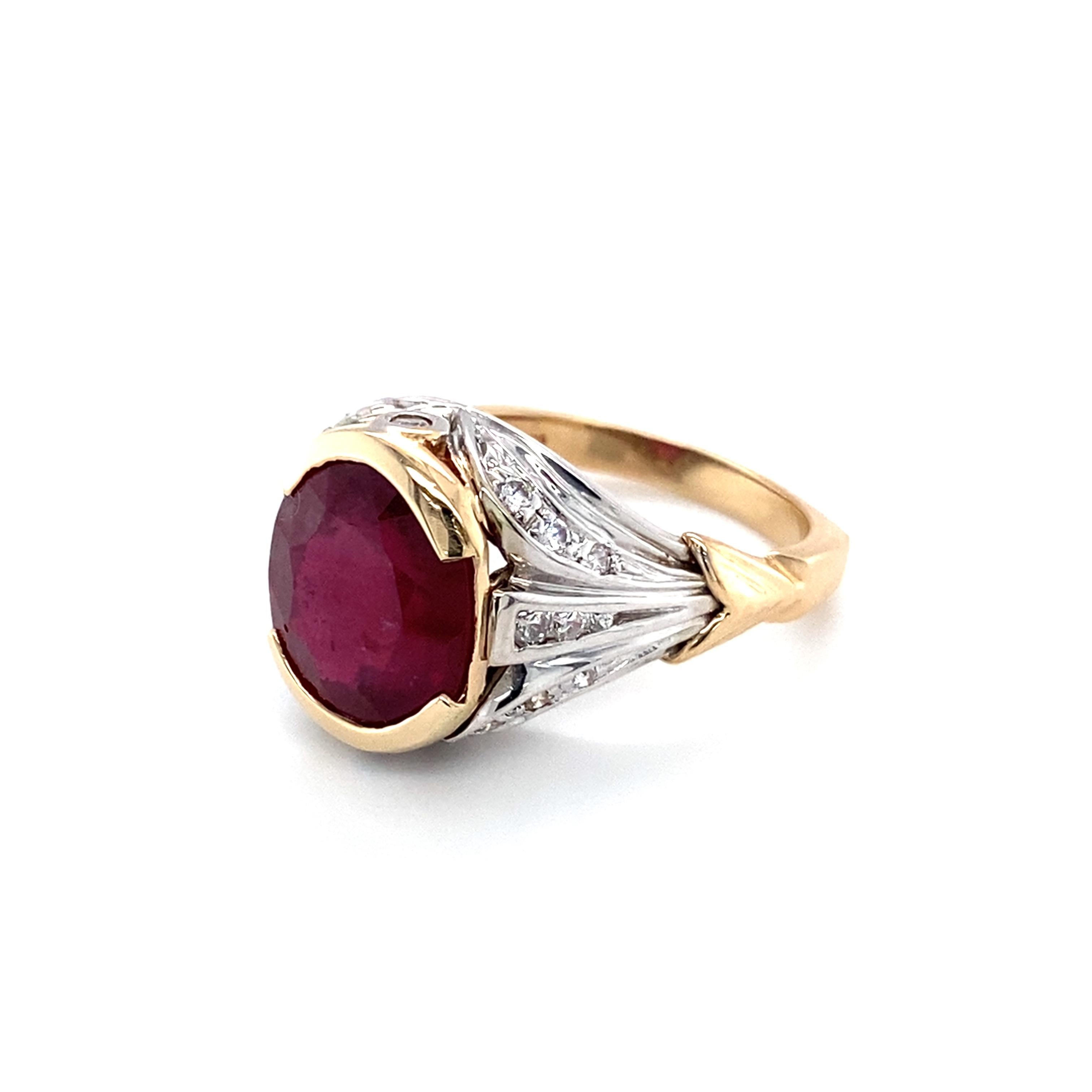 Item Details:
1960s Retro
Gemstone: Ruby and Diamond
Size: 9.5, can be resized
Metal: 14 Karat Yellow Gold & Platinum
Weight: 9 grams

Ruby Details:
Cut: Oval
Carat: 5.20 
Color: Pigeon Blood Red

Diamond Details:
Carat: 0.30 carat total weight
Cut: