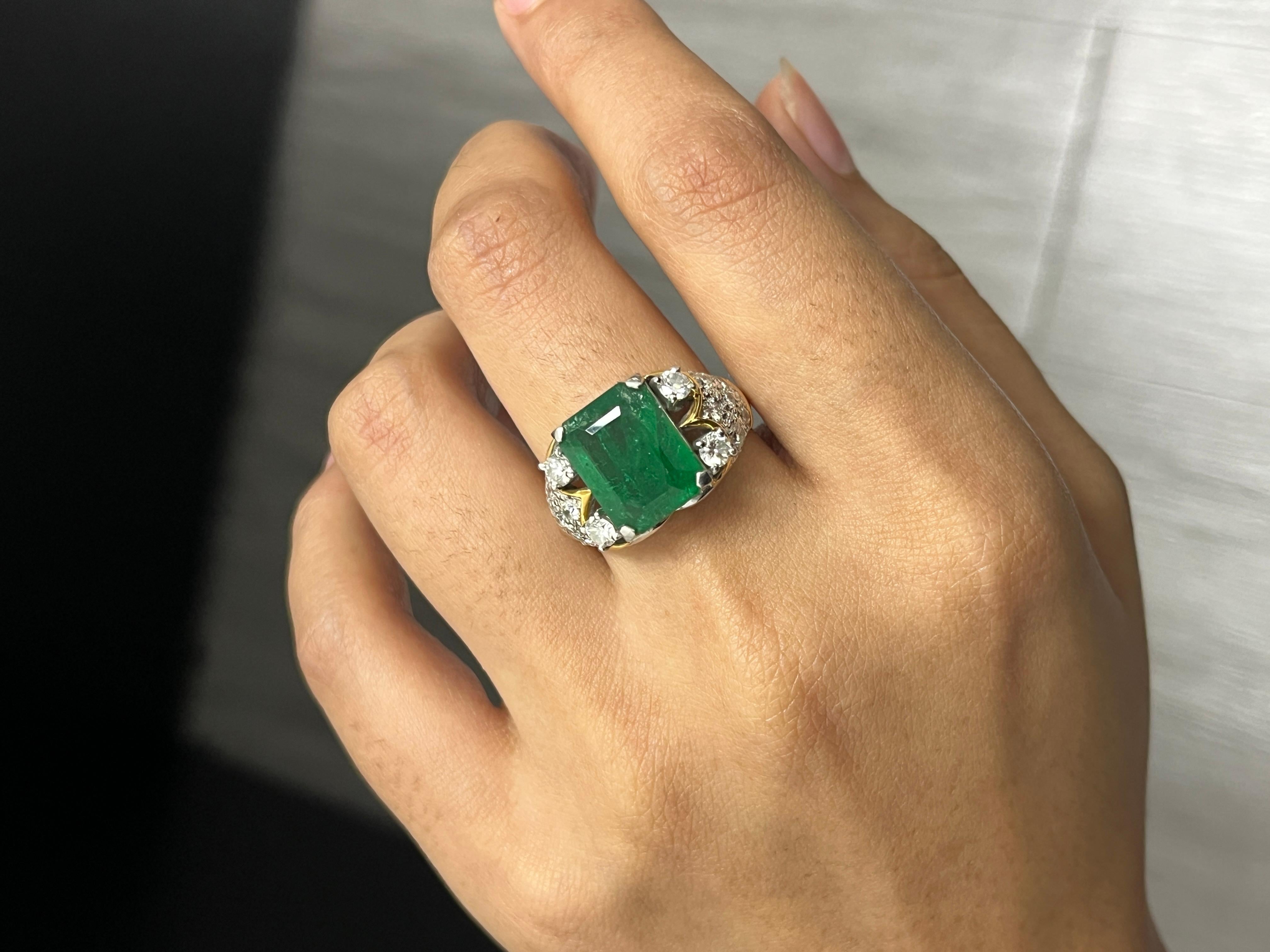 Introducing the epitome of luxury and sophistication, behold the breathtaking Art Deco inspired, Emerald Statement Ring, a true marvel in the world of fine jewelry. Crafted with precision and passion, this extravagant piece exudes opulence from