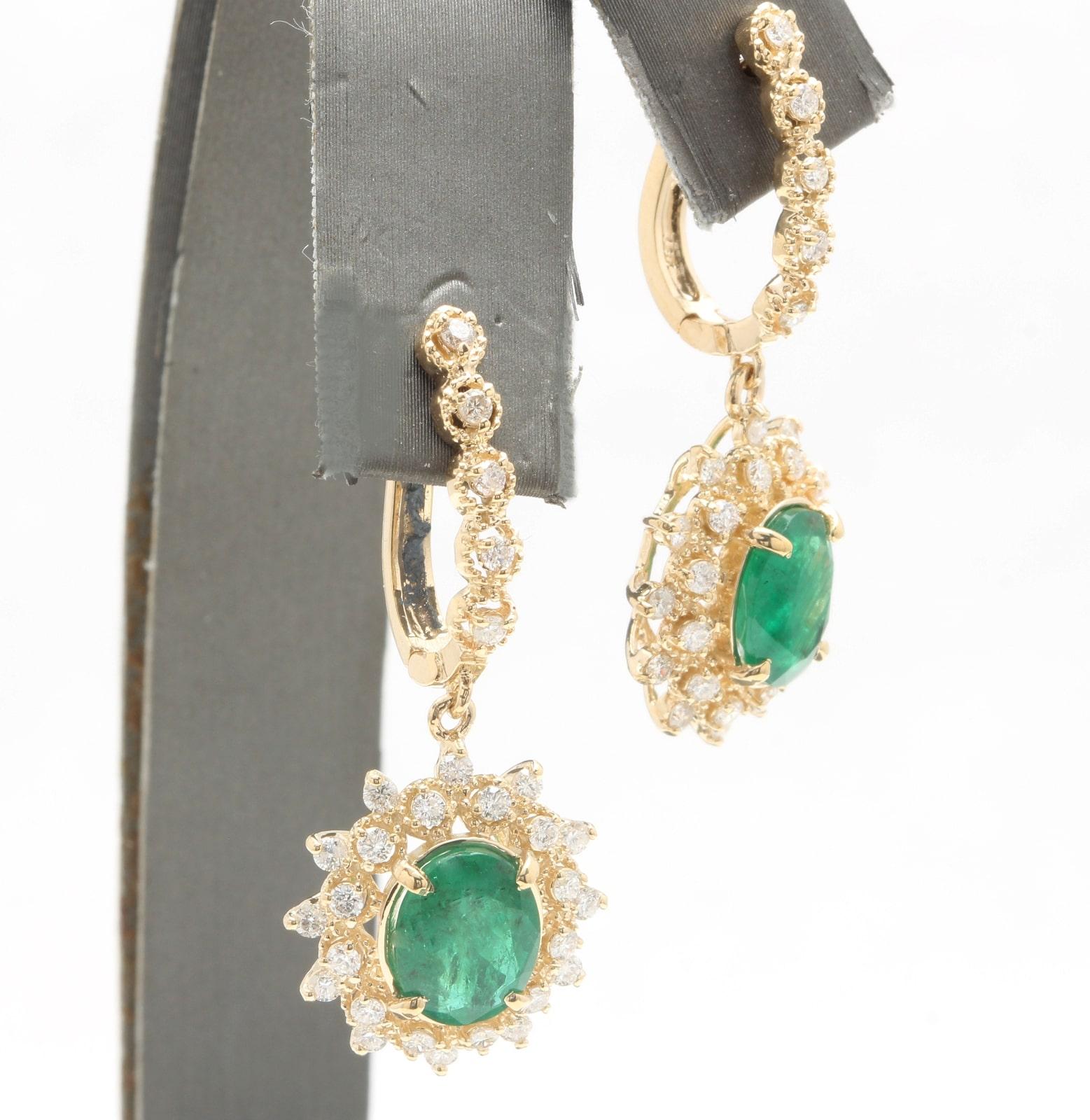5.20 Carats Natural Emerald and Diamond 14K Solid Yellow Gold Earrings

Amazing looking piece! 

Suggested Replacement Value Approx. $8,000.00

Total Natural Round Cut White Diamonds Weight: Approx. 1.40 Carats (color G-H / Clarity SI1-SI2)

Total