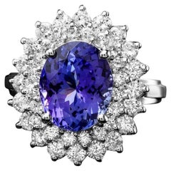 Anello in oro bianco massiccio 14K con tanzanite naturale e diamanti da 5,20 carati