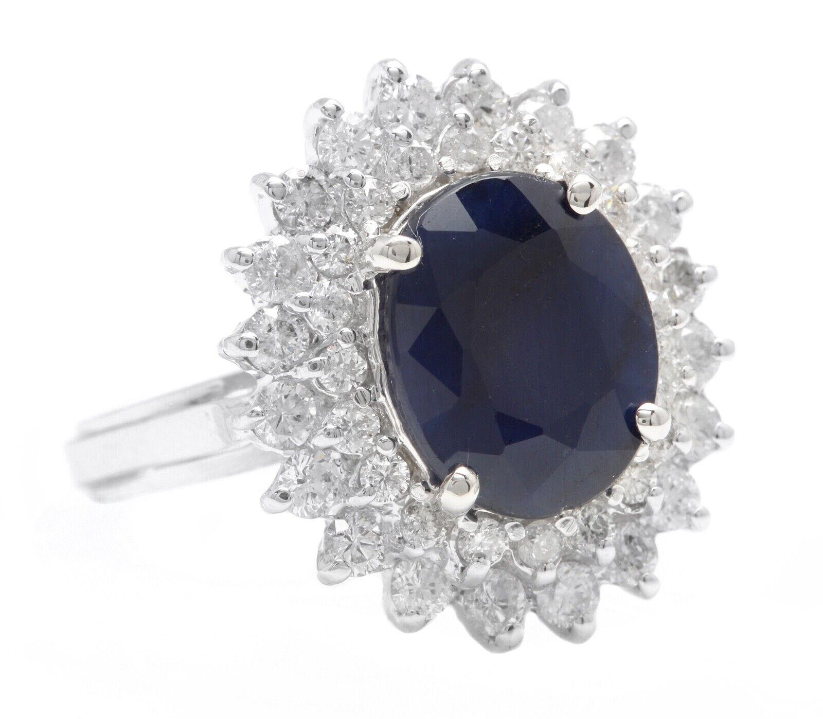 5.20 Carats Exquisite Natural Blue Sapphire and Diamond 14K Solid White Gold Ring

Suggested Replacement Value $6,500.00

Total Blue Sapphire Weight is: Approx. 4.00 Carats 

Sapphire Measures: Approx. 10.90 x 8.90 mm

Natural Round Diamonds Weight: