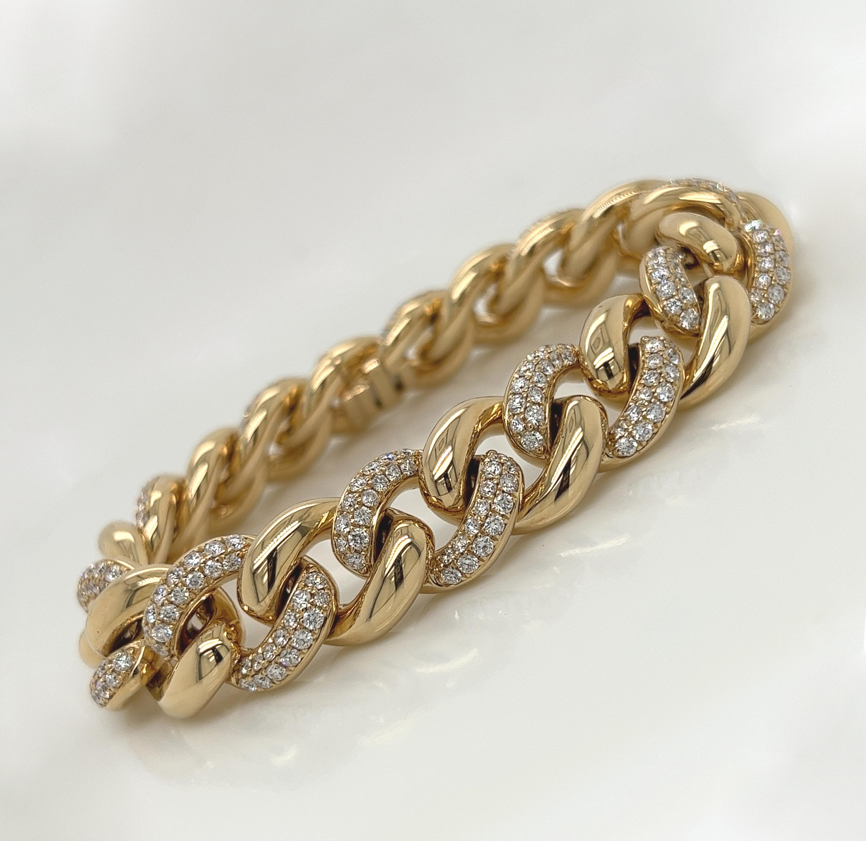 5.21 Carat 14K Yellow Gold Iced Out Cuban Link Diamond Bracelet, 41.9g

This handmade cuban link diamond bracelet weighs 41.9 grams. It boasts a whopping 5.21 Carat of sparkling round cut white diamonds exquisitely pave set into cuban links. The