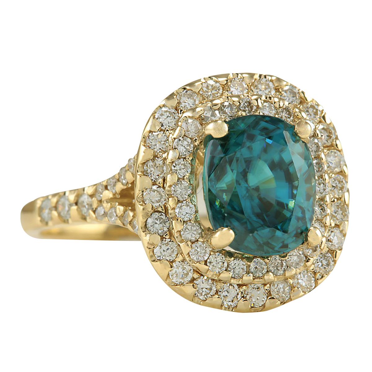 Stamped: 14K Yellow Gold
Total Ring Weight: 4.8 Grams
Total Natural Zircon Weight is 4.46 Carat (Measures: 9.00x7.00 mm)
Color: Blue
Total Natural Diamond Weight is 0.75 Carat
Color: F-G, Clarity: VS2-SI1
Face Measures: 14.60x13.60 mm
Sku: [702091W]