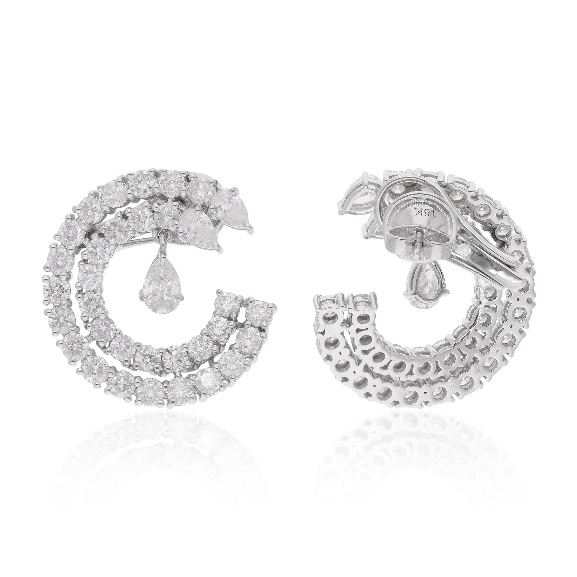 The pear-shaped diamond is known for its elegant and distinctive teardrop shape, while the round diamond offers a classic and brilliant appearance. This combination creates a beautiful contrast and adds visual interest to the earrings.

Item Code :-