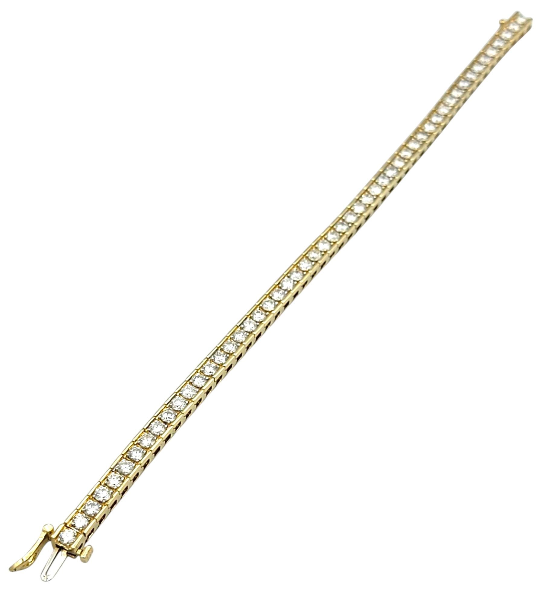 Round Cut 5.21 Carat Total Channel Set Round Diamond Tennis Bracelet 14 Karat Yellow Gold For Sale