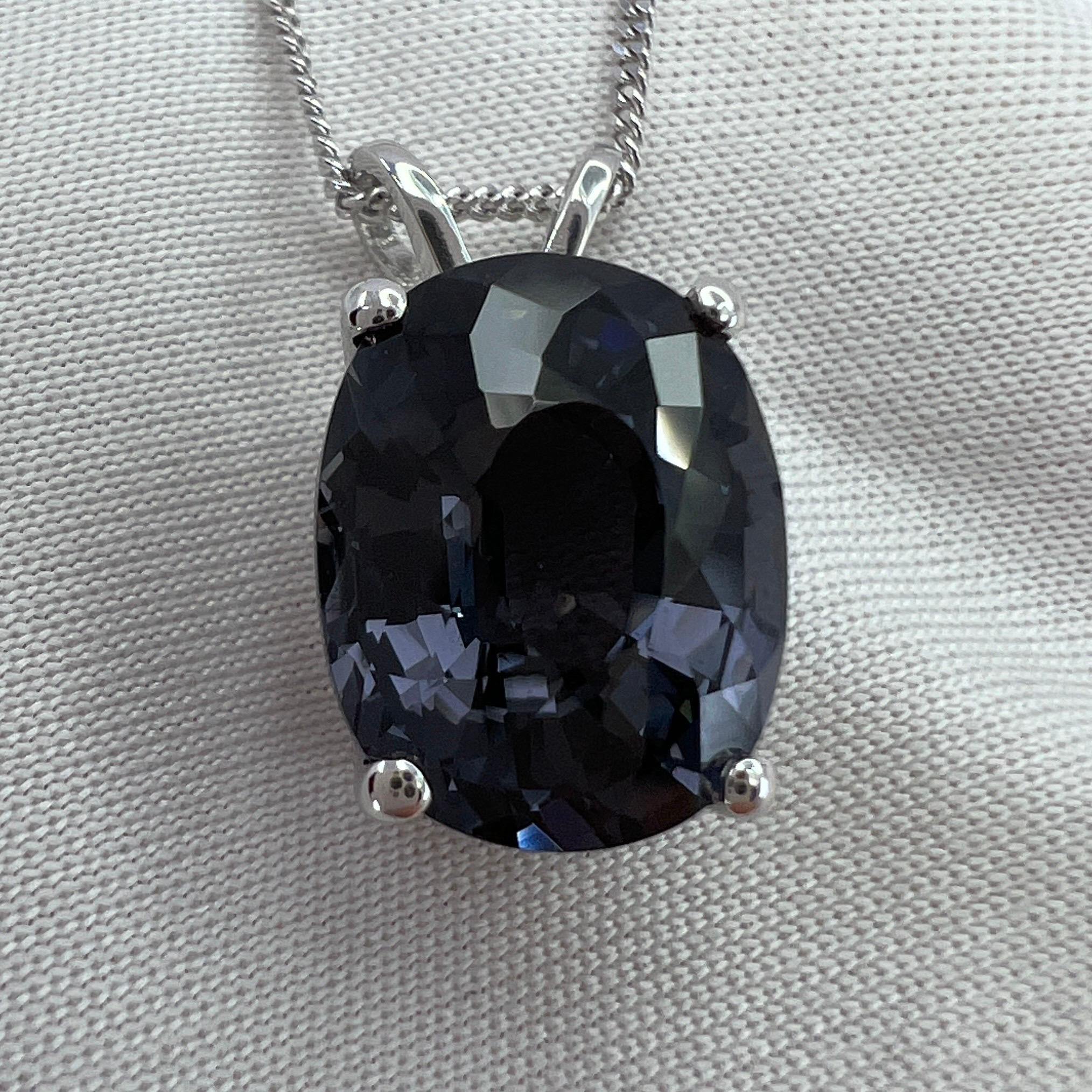 Rare Purple Gray Titanium Spinel Fancy Oval Cut 18k White Gold Solitaire Pendant Necklace.

Large 5.21 Carat spinel with a beautiful greyish blue purple colour. Often called titanium in the trade. This spinel has an excellent fancy oval cut also