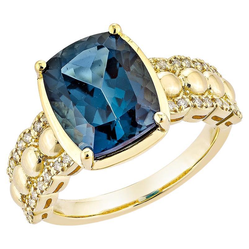 5.22 Carat London Blue Topaz Fancy Ring in 18Karat Yellow Gold with Diamond. For Sale