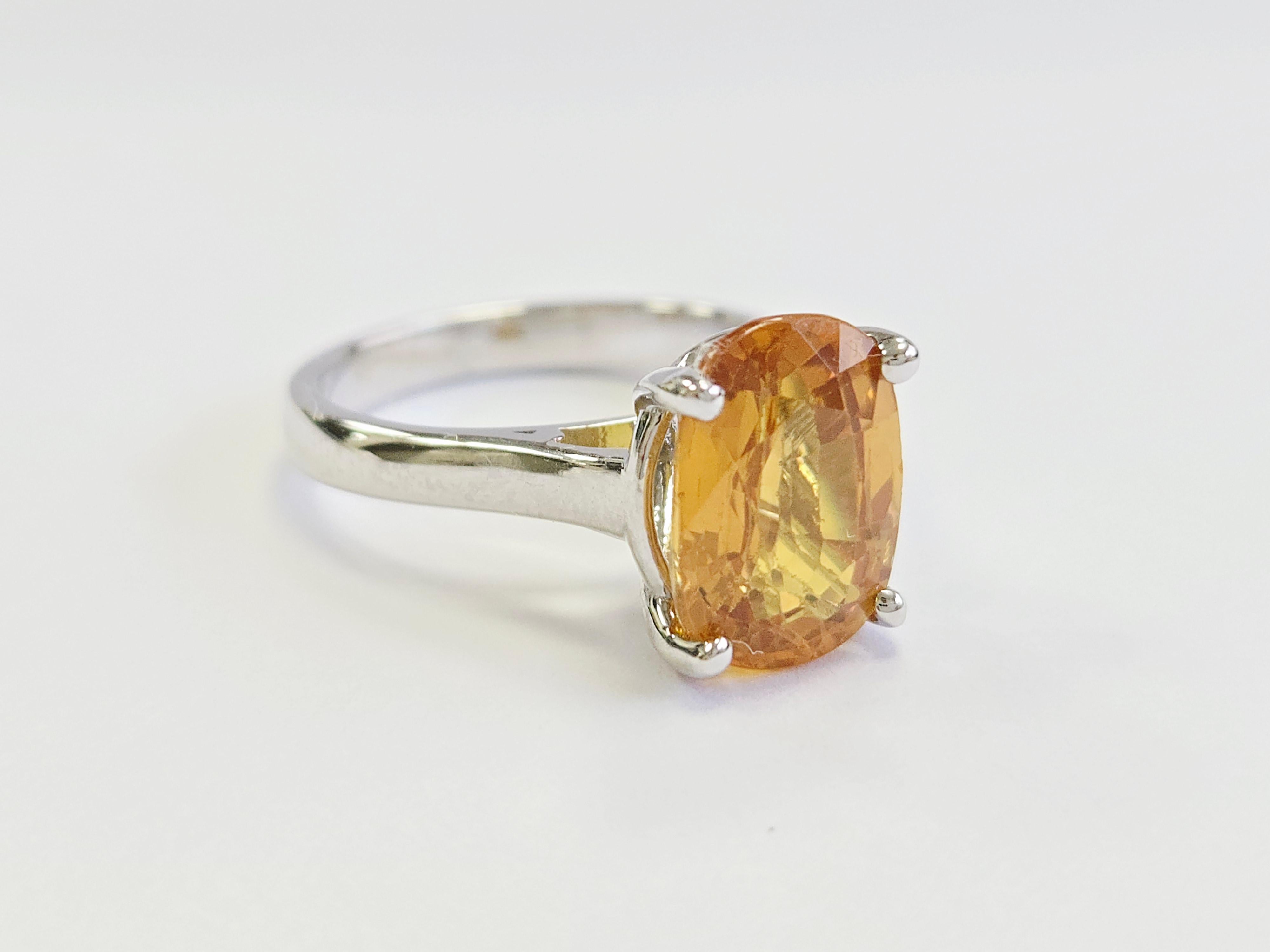 5.22-Carat Natural Oval-Shaped Vivid Yellow Sapphire Ring in 14K White Gold

This exquisite ring features a natural, oval-shaped vivid yellow sapphire weighing 5.22 carats, renowned for its rich, intense color and remarkable clarity. The vibrant