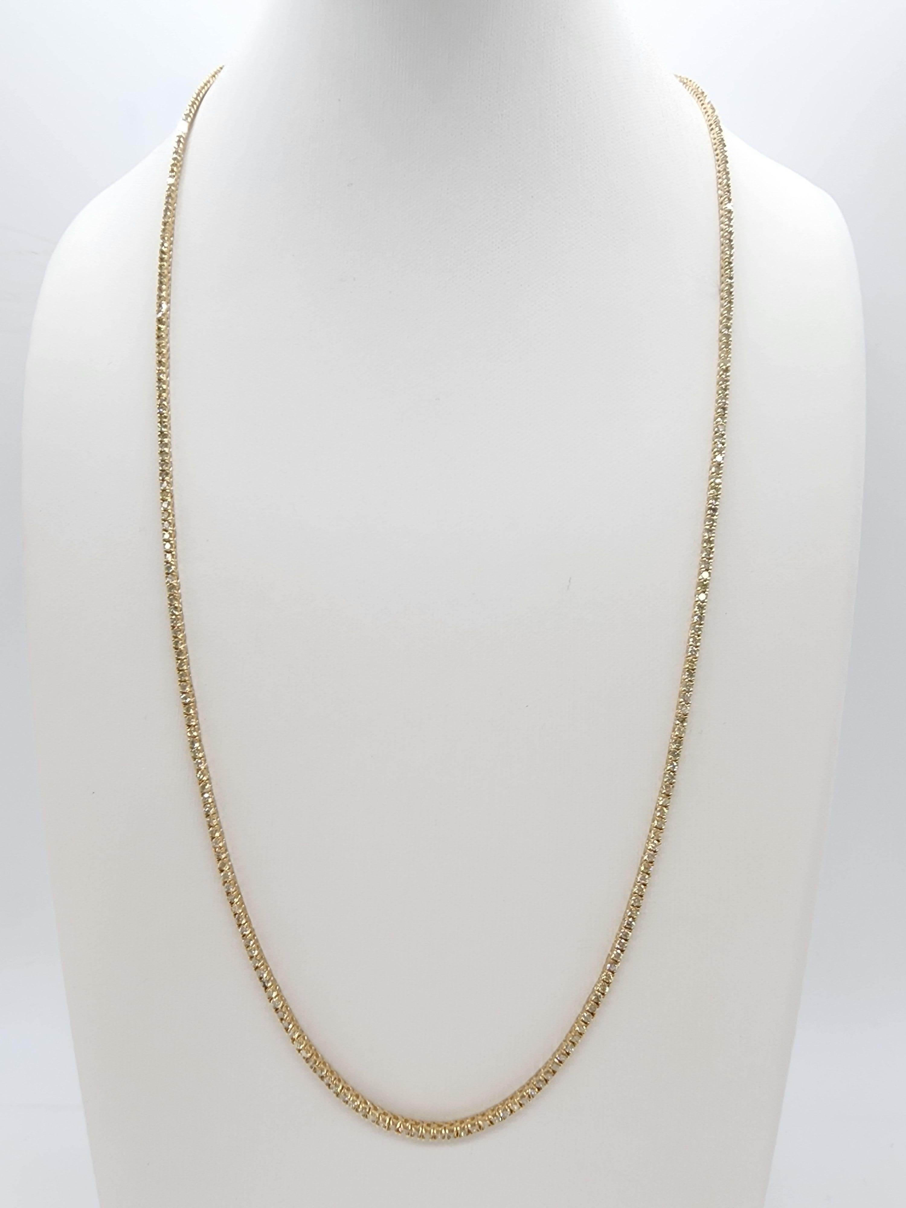 Brilliant and beautiful tennis necklace, natural round-brilliant cut white diamonds clean and Excellent shine. 14k yellow gold classic four-prong style for maximum light brilliance. Elegance for every occasion.

22 inch length 
Average Color: