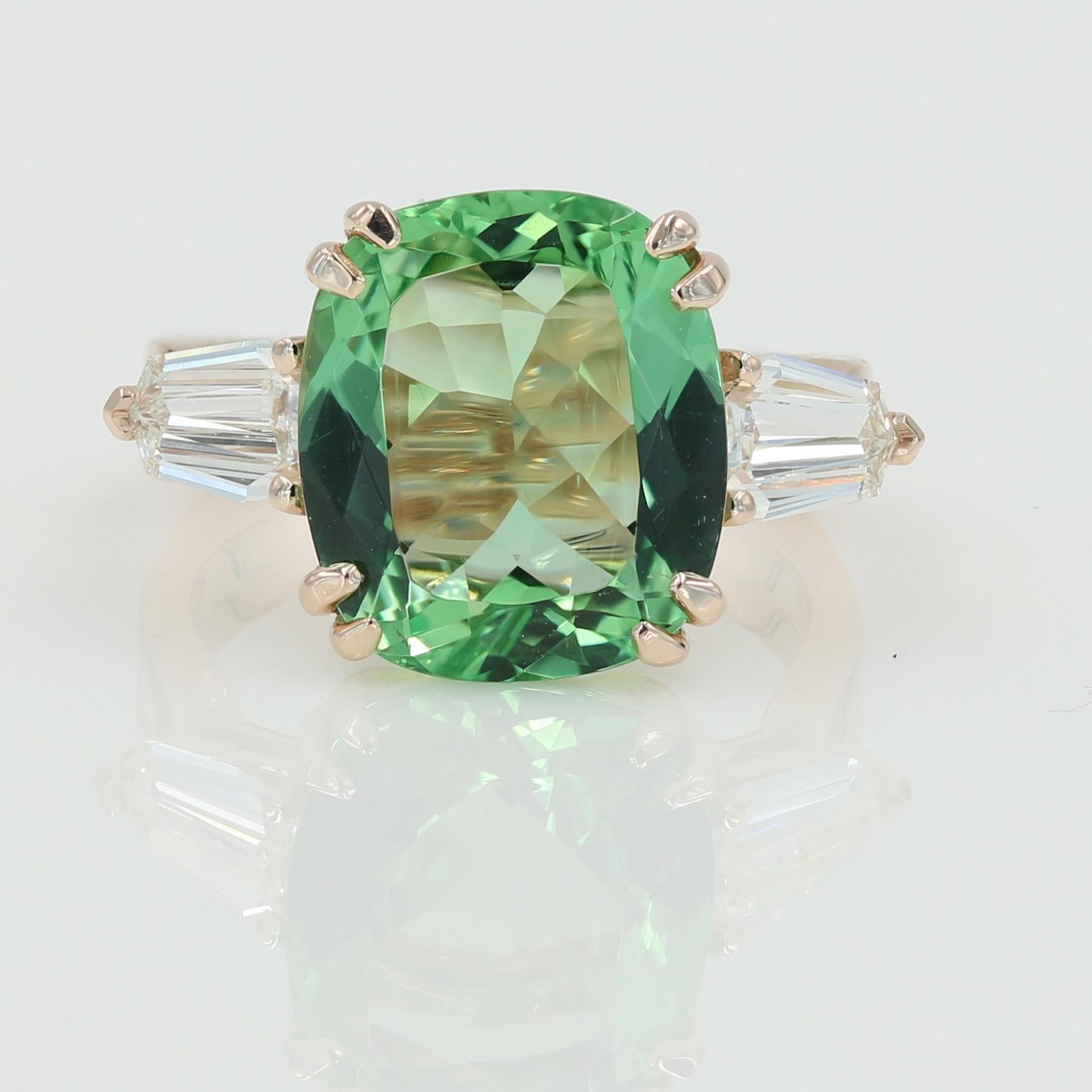 Natural cushion cut Green Beryl weighing 5.22cts set in a Lester Lampert original 14kt Rose Gold mounting with 2 shield cut diamonds weighing 0.84ctw. (F-G VS) 