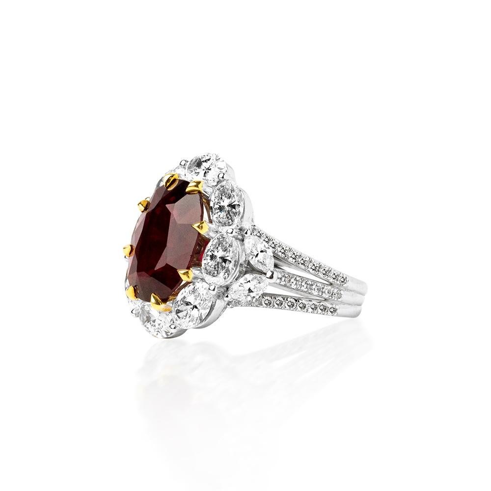  This beautiful Ruby is originated as African, has a deep red color with an amazing saturation and clarity , surrounded with 8 pieces of a perfect selection Oval Cut -D to F VVS- diamonds .
Stone : 5.23 Ct's Natural African Ruby
Diamonds : 4.16 Ct's