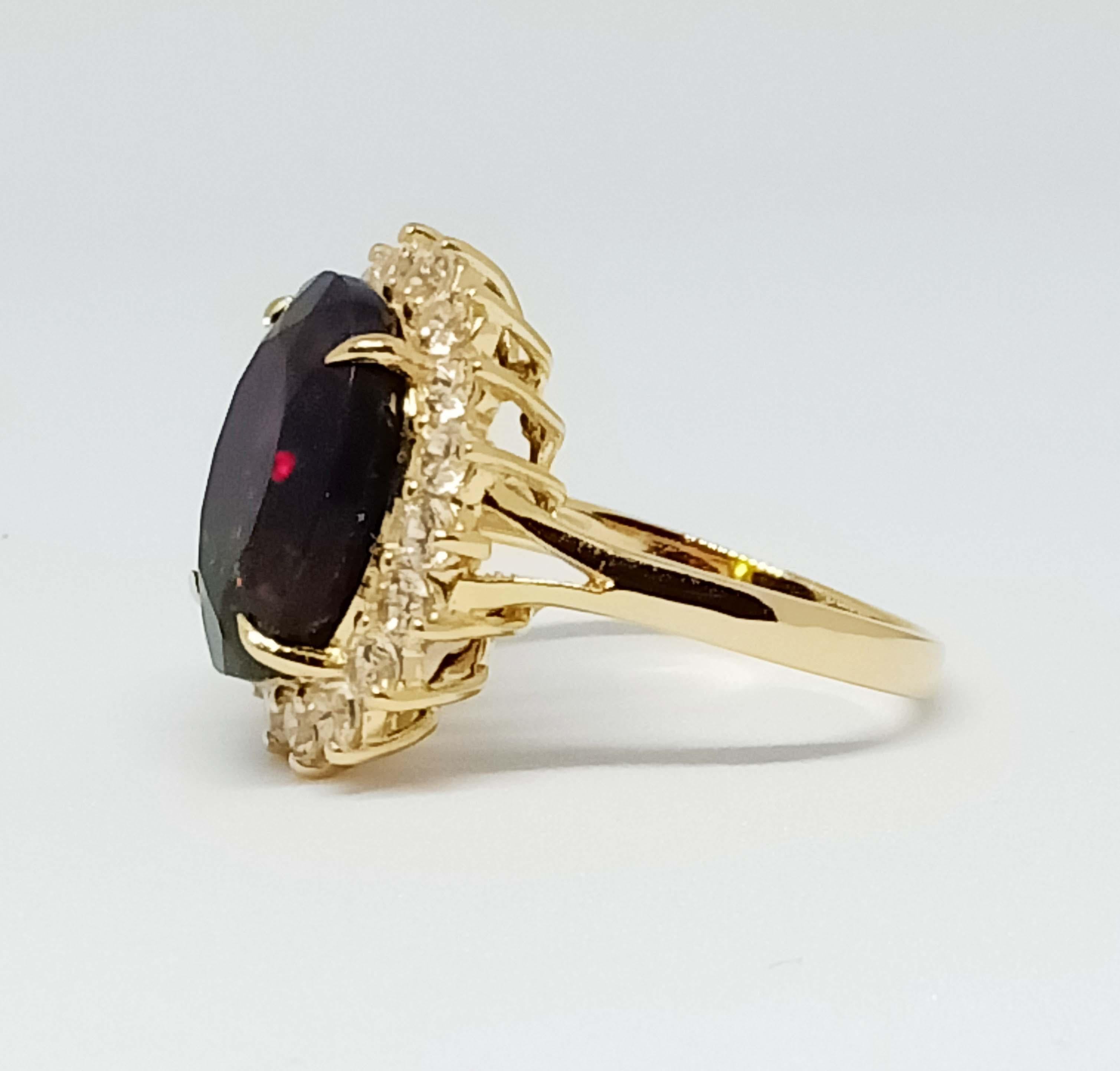 Oval Cut 5.23cts Black Opal ring. Sterling Silver in 18K Gold Plated. For Sale