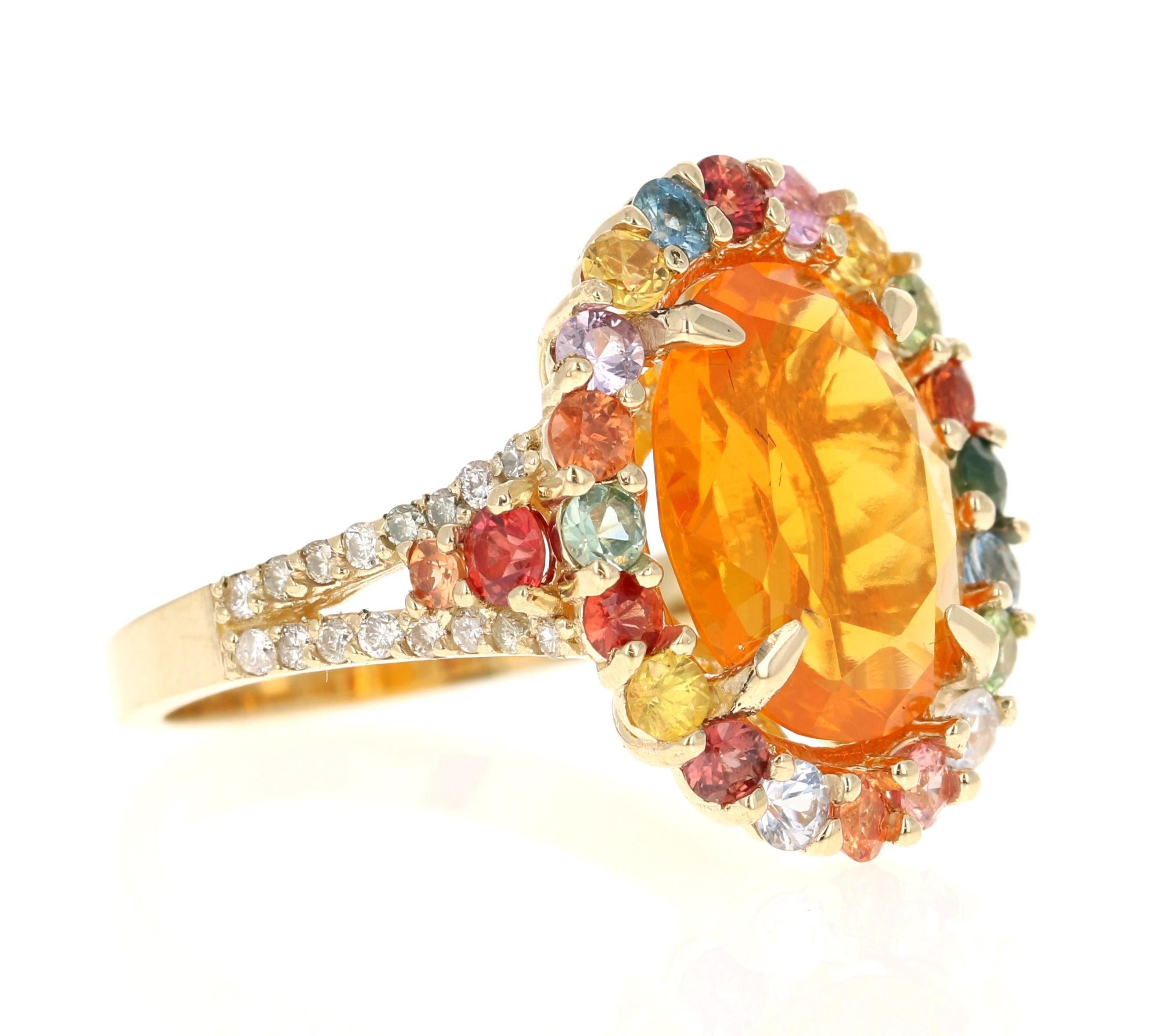 5.24 Carat Fire Opal Sapphire Diamond Yellow Gold Cocktail Ring

This ring features a 3.30 carat Oval Cut Fire Opal in the center, surrounded by a halo of Round Cut Rainbow Sapphires weighing a total of 1.68 carats. Additional accents include