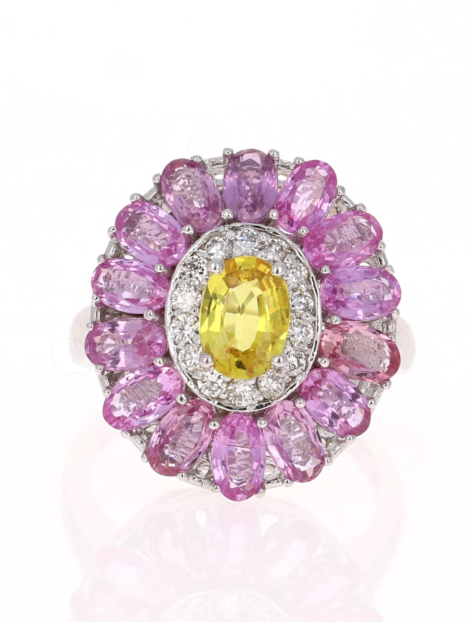 The Cutest Cocktail Ring!

This beautiful ring has a Yellow Sapphire that weighs 0.87 Carats and Pink Sapphires that weigh 4.07 Carats. There are 14 Round Cut Diamonds that weigh 0.30 Carats. The total carat weight of the ring is 5.24 Carats.