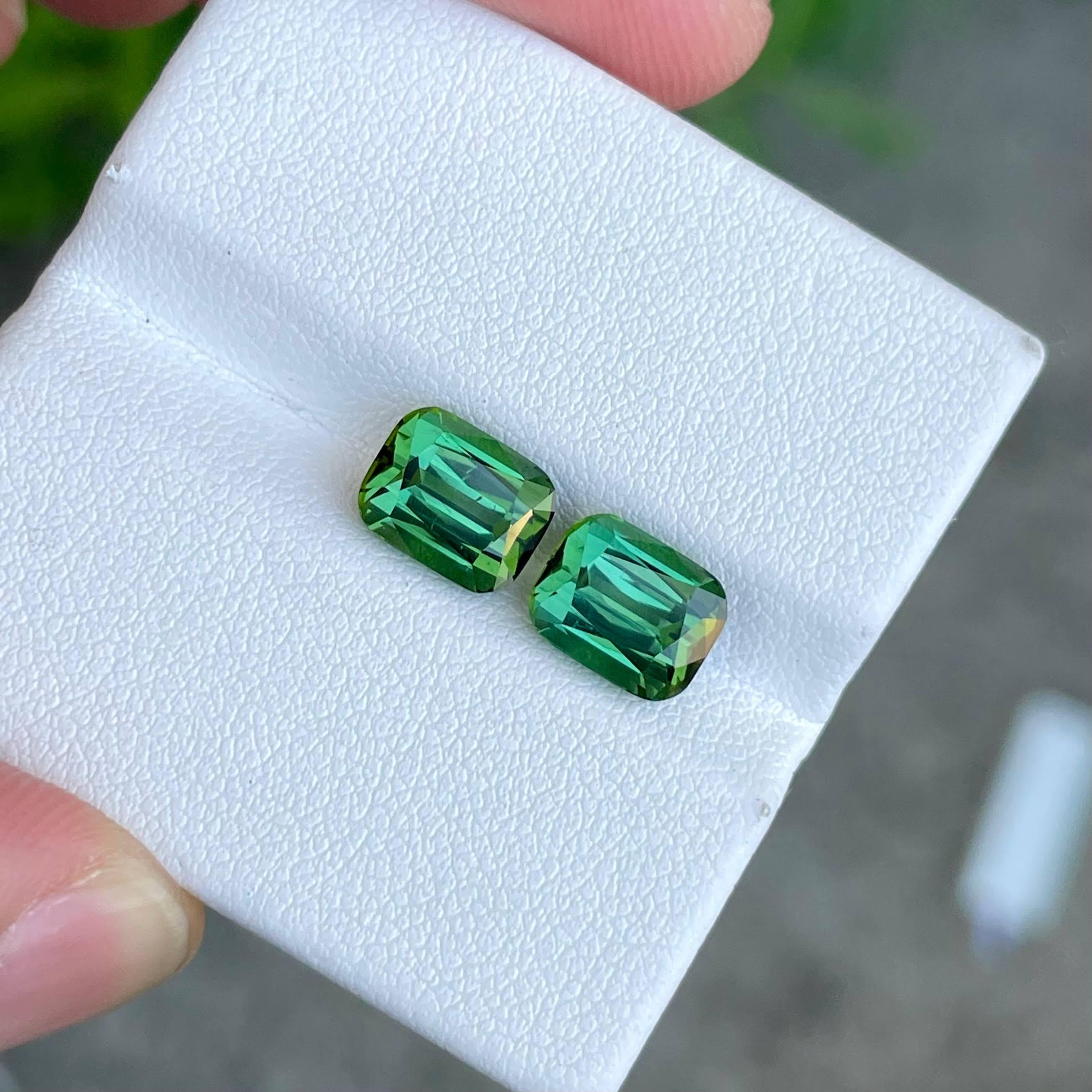 Weight 5.24 carats
Dimensions 8.3x6.6x5.6 mm
Treatment none 
Origin Afghanistan 
Clarity SI
Shape cushion 
Cut fancy cushion




This exquisite pair of Bluish Green tourmaline gemstones boasts a combined weight of 5.24 carats, each expertly crafted