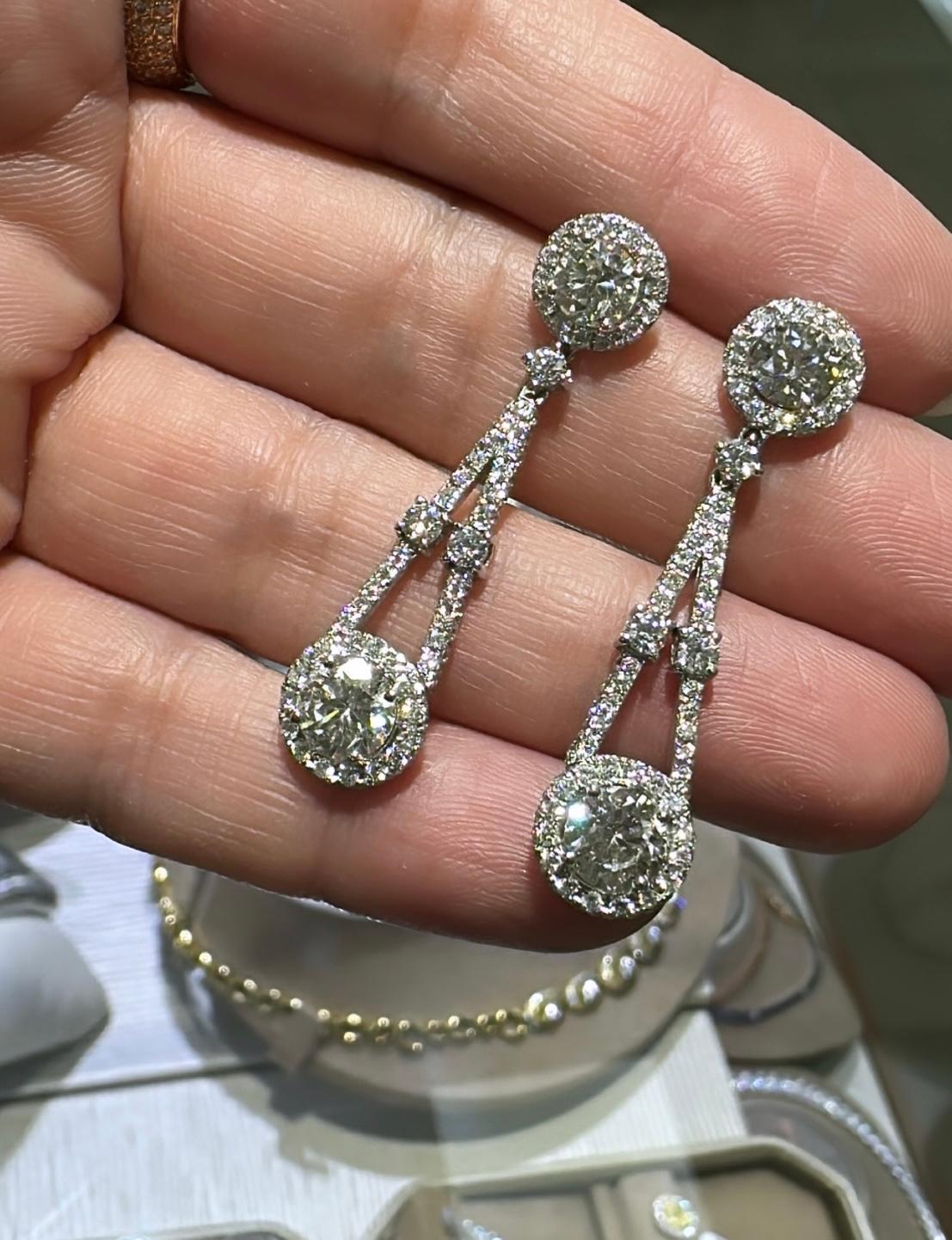 Love art-deco inspired jewelry earrings? Then these gorgeous 5.24ctw diamond earrings are a must-have for your jewelry box. They are beautifully faceted and will glimmer with every move that you make.
Metal: 18K White Gold
Diamond Shape: Round