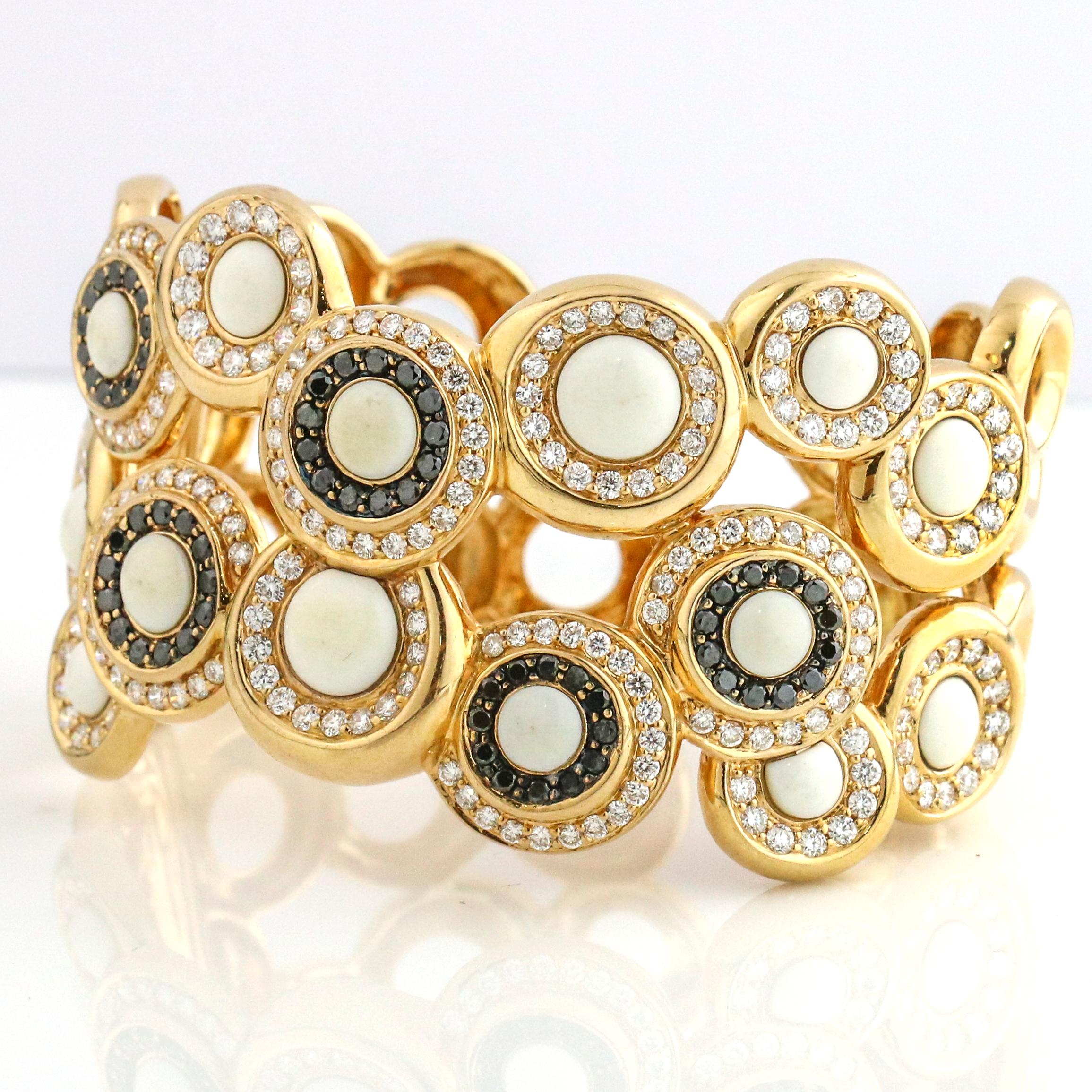 Modern 5.25 Carat 18 Karat Yellow Gold White Coral Black Diamond Hinged Cuff Bracelet For Sale