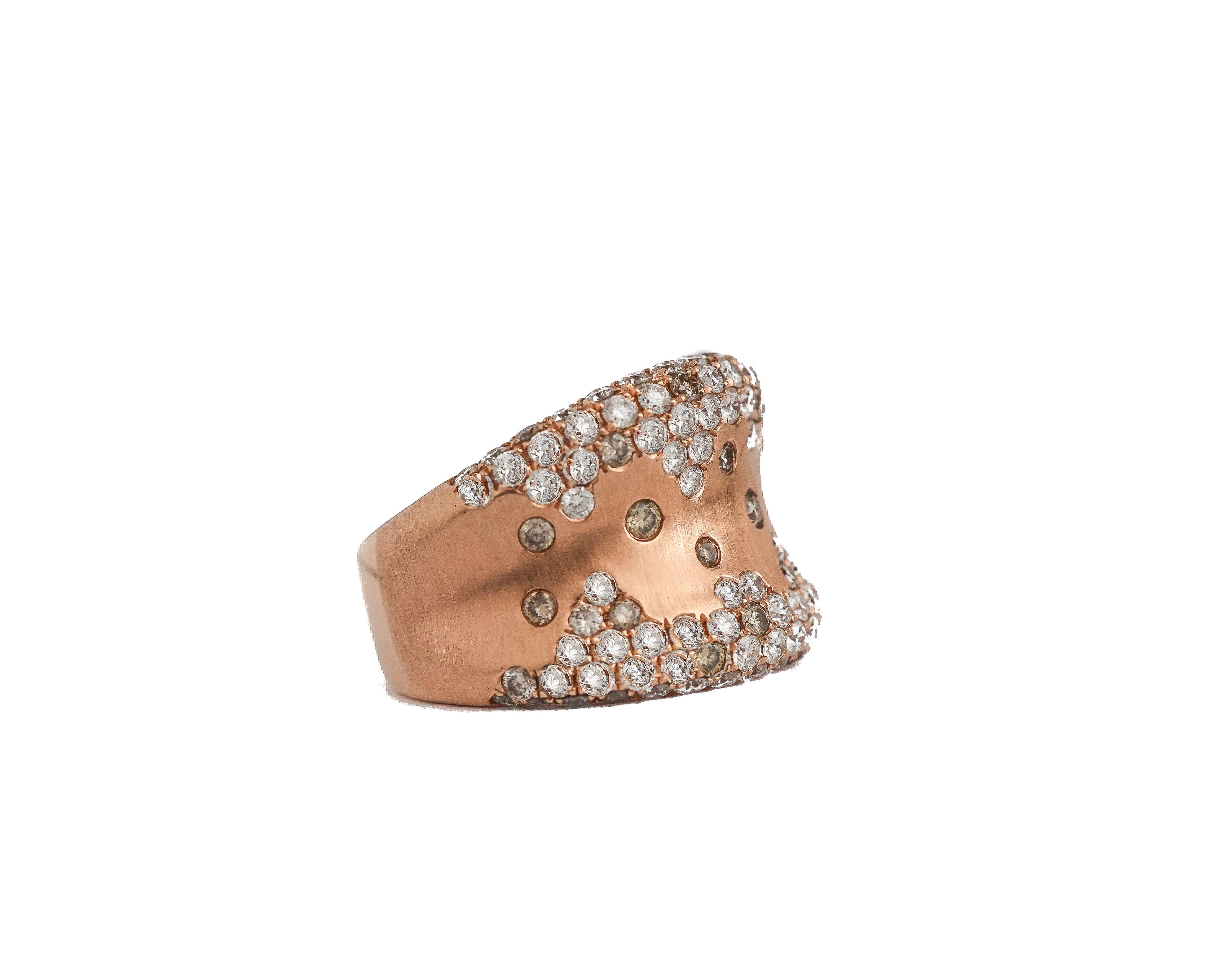 Item Details:
Metal Type: 18 Karat Rose Gold
Weight: 15 grams
Size: 7 (resizable)

Diamond Details:
Cut: Round Brilliant
Carat: 5.25 Carat Total Weight
Color: H-K
Clarity: VS

1990s, very unique rose gold diamond cocktail ring. High contrast rose