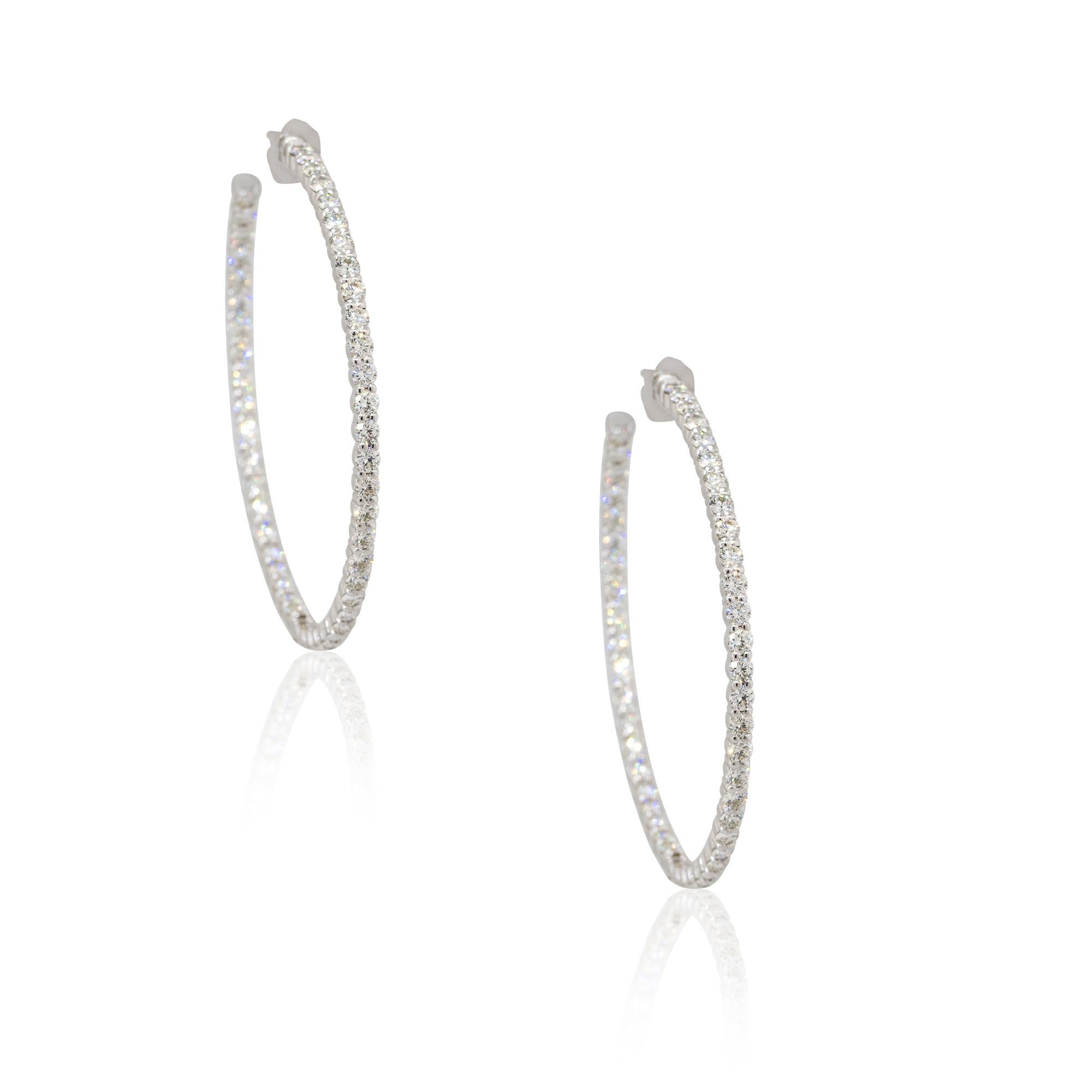 Material: 14k White Gold
Diamond Details: Approx. 5.25ctw of round cut Diamonds. Diamonds are G/H in color and VS in clarity. 50 stones total
Earring Measurements: 49mm x 50mm x 2.5mm
Total Weight: 12g (7.7dwt) 
Earring backs: tension