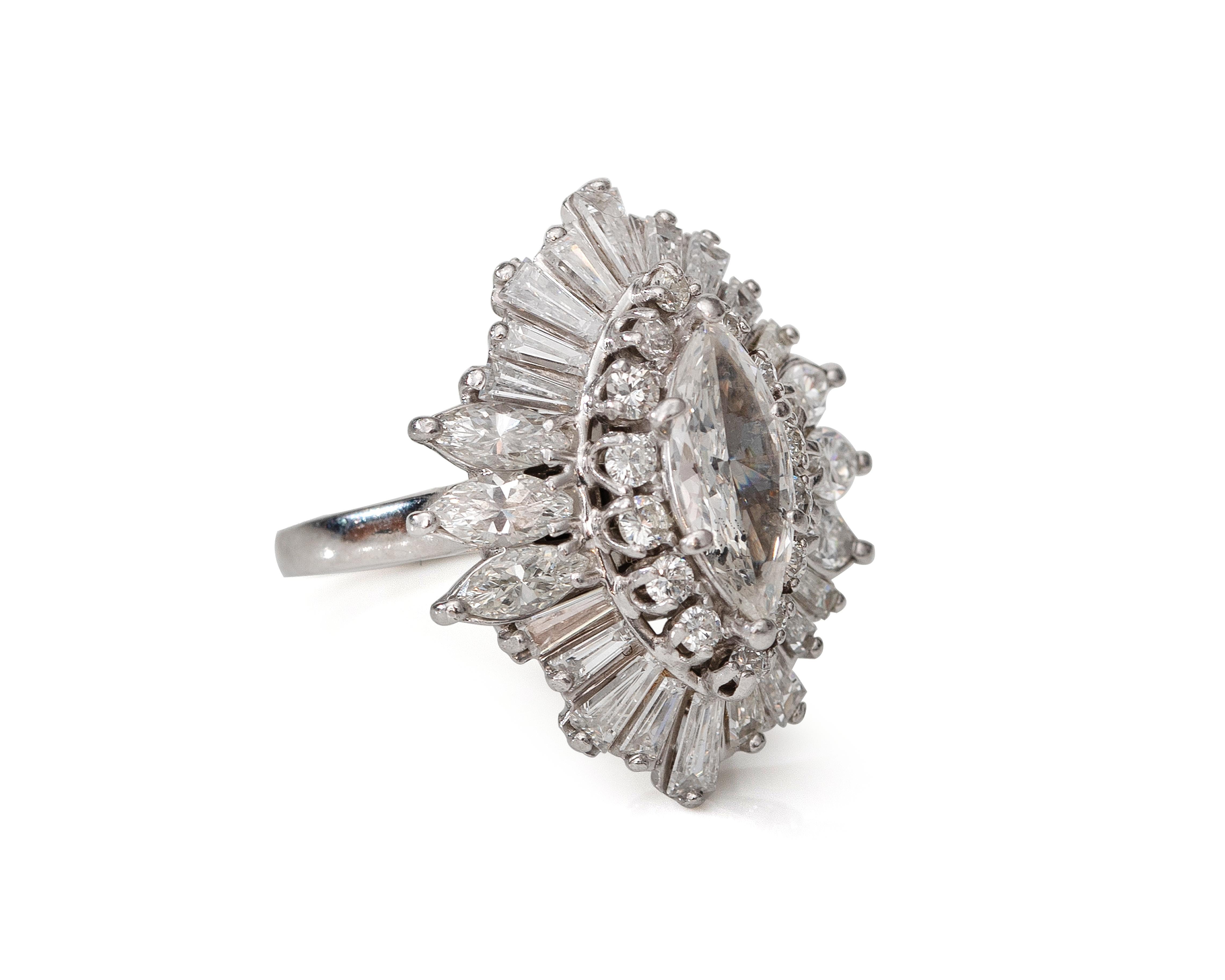 Ring Details:
Metal Type: Platinum
Weight: 16.06 grams
Size: 6.25 

Center Diamond Details:
Cut: Marquise
Carat: 1.5
Color: G
Clarity: VS

Accent Diamond Details:
Cut: Marquise and Baguette 
Carat: 3.75 carats
Color: G
Clarity: VS

