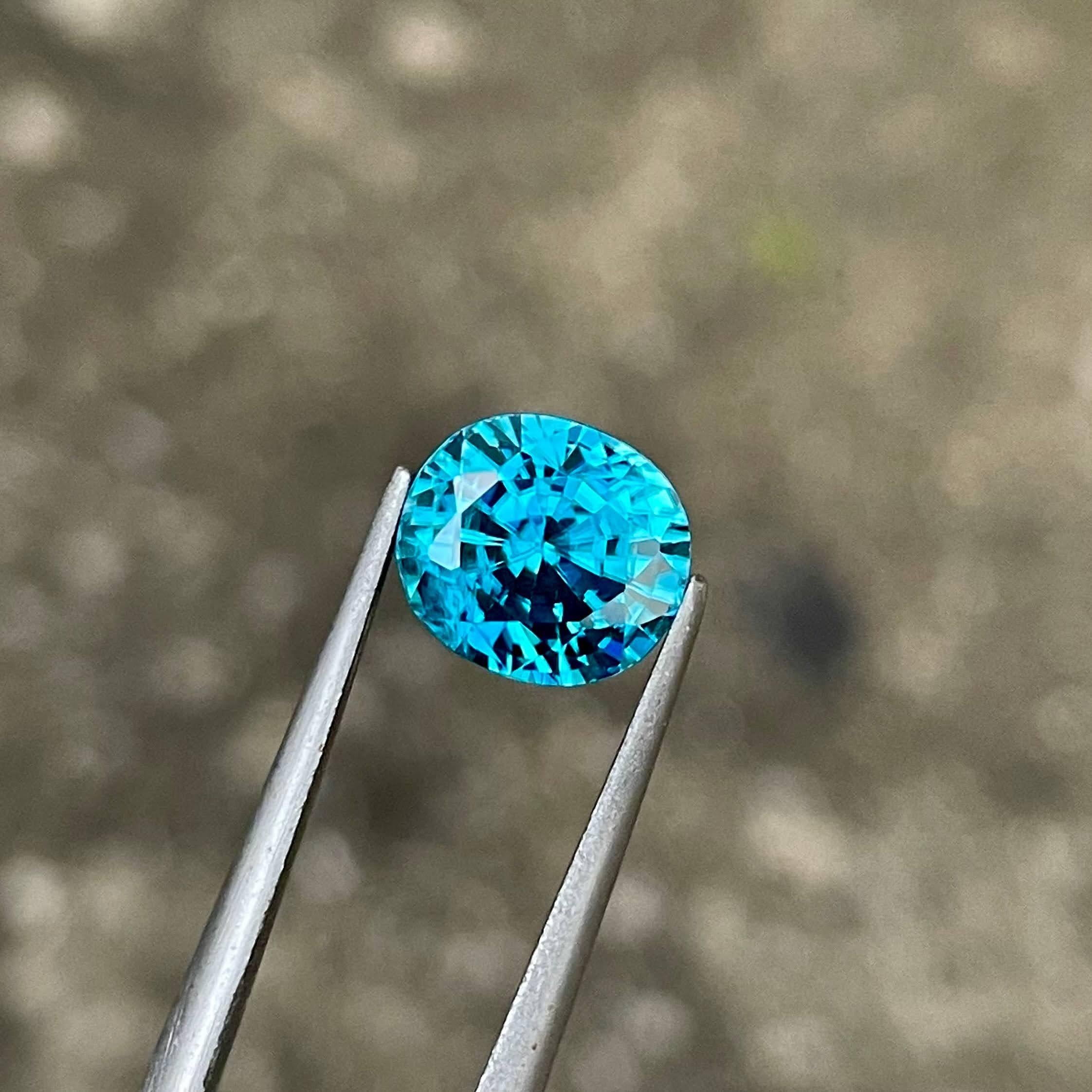 Weight 5.25 carats 
Dimensions 8.70x7.80x7.20 mm
Treatment Heated 
Origin Cambodia 
Clarity VVS 
Shape oval 
Cut Faceted 



This exquisite 5.25 carat Electric Blue Zircon gemstone is a stunning example of natural beauty, sourced from the rich lands