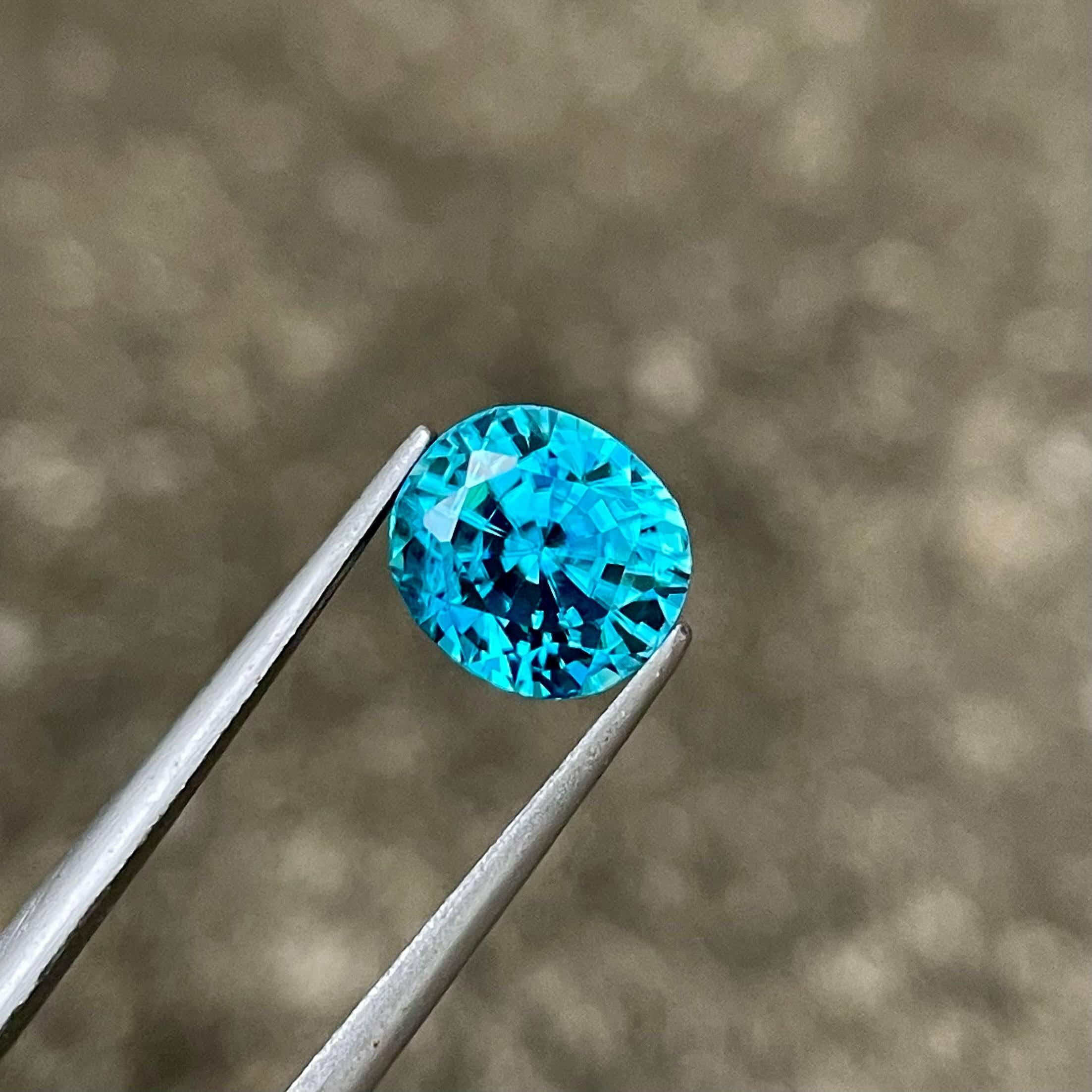 Modern 5.25 carats Electric Blue Zircon Stone Oval Cut Natural Cambodian Gemstone For Sale