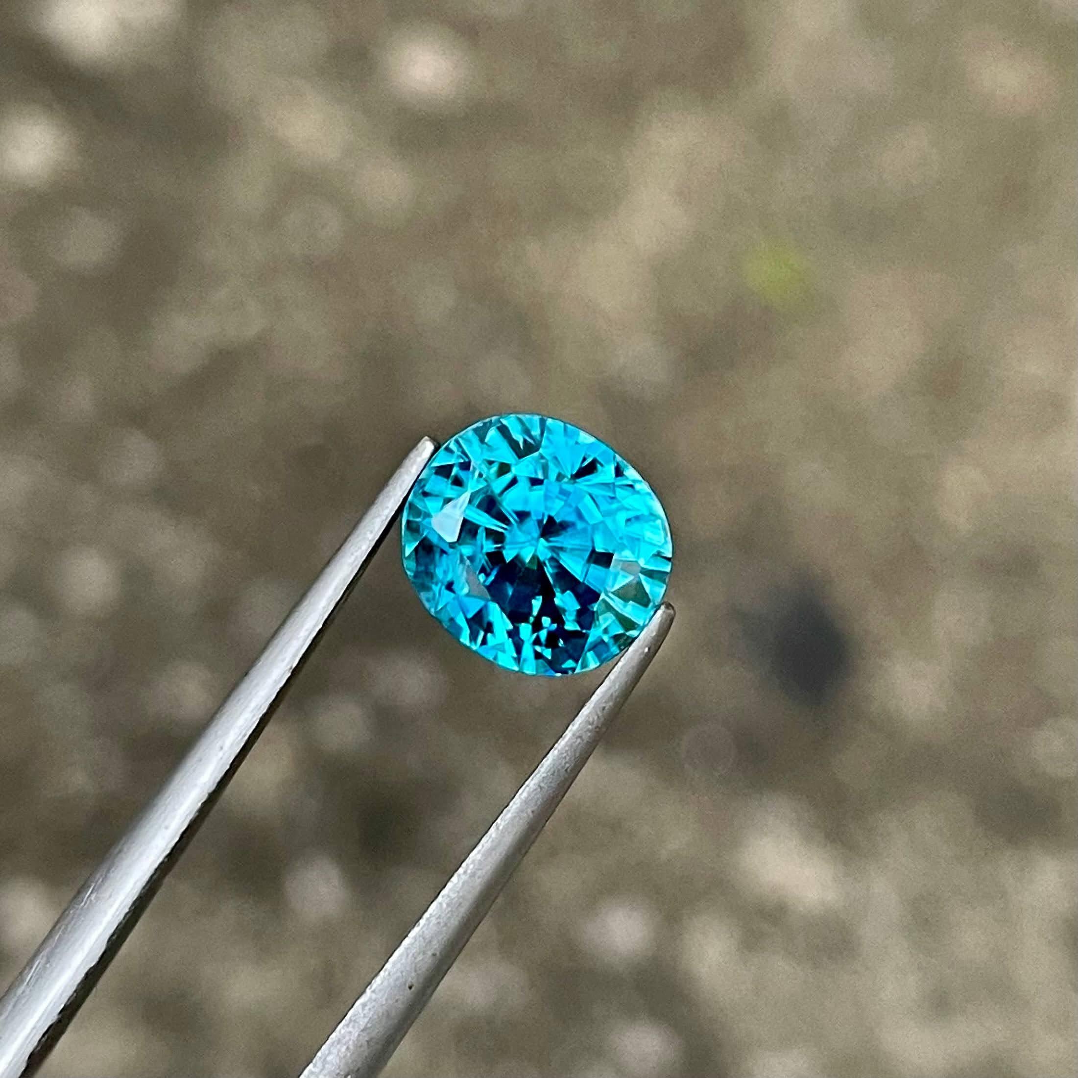 Women's or Men's 5.25 carats Electric Blue Zircon Stone Oval Cut Natural Cambodian Gemstone For Sale