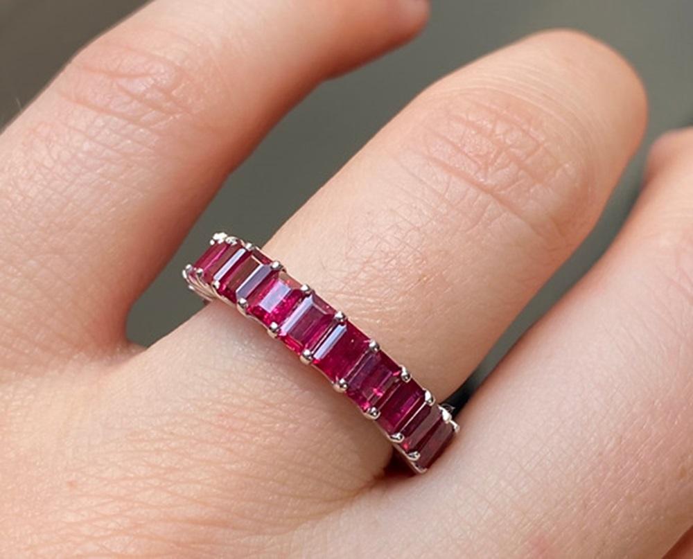Ruby Weight: 5.25 CTS, Measurements: 4 x 2.5 mm, Metal: 18K White Gold, Ring Size: 6, Shape: Baguette, Color: Red, Hardness: 9, Birthstone: July