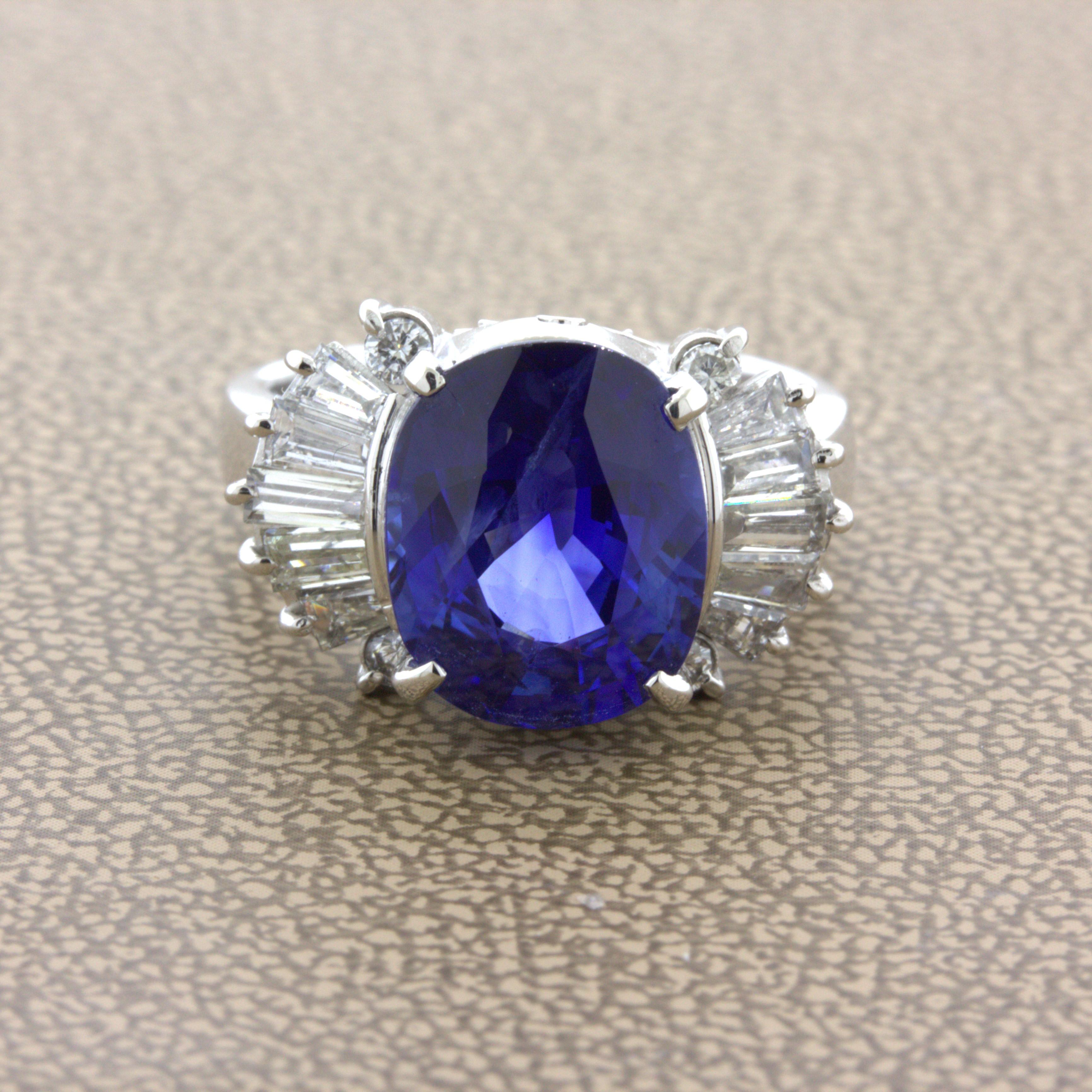 A fine natural gem takes center stage of this platinum diamond ring. It is a 5.26 carat sapphire from Sri Lanka (Ceylon). It has a superb vivid blue color with plenty of brilliance and sparkle making the stone shimmer in the light. It is