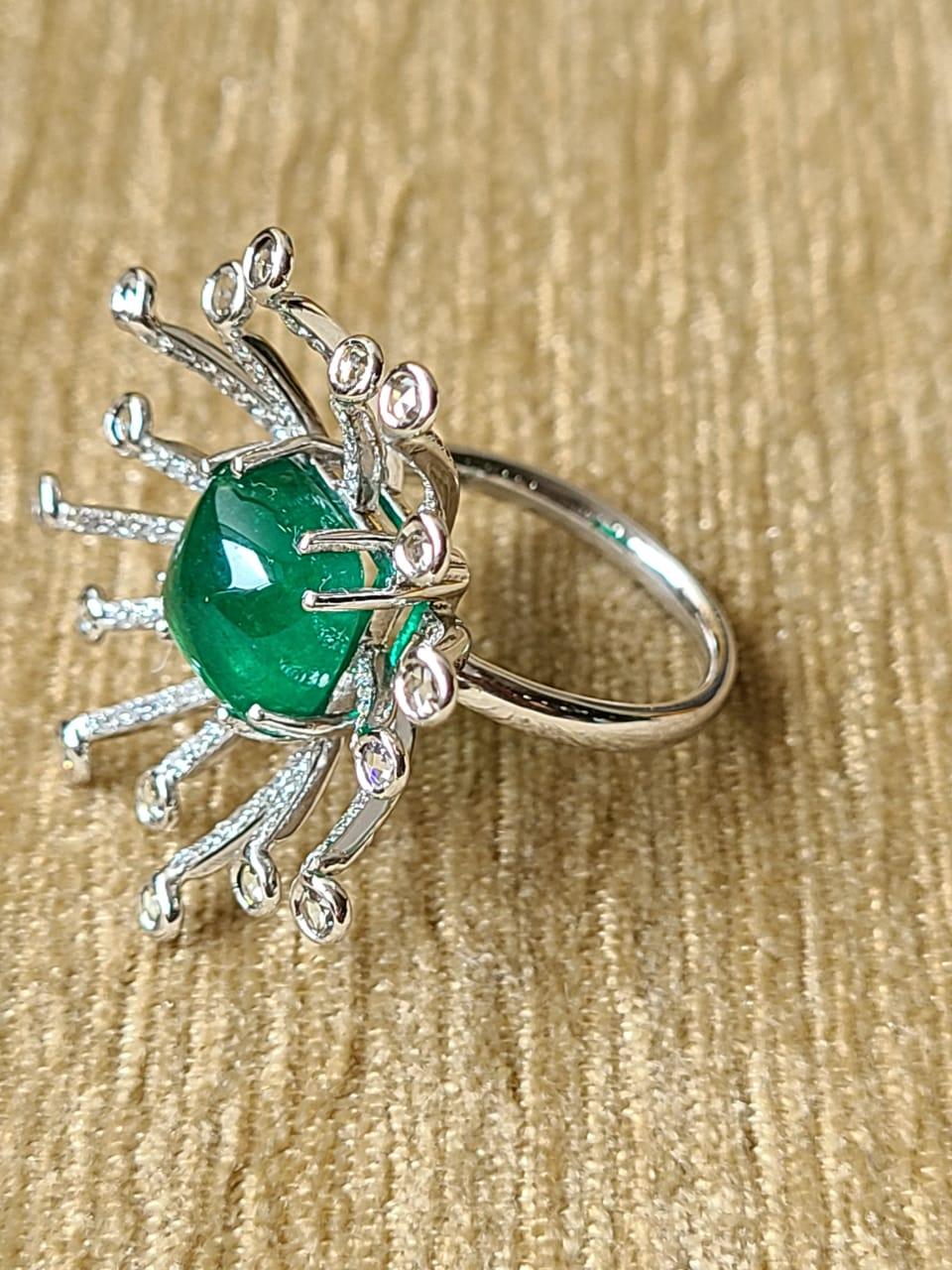 Modern 5.26 Carat Natural Emerald Cabochon Ring Set in 18 Karat Gold with Diamonds